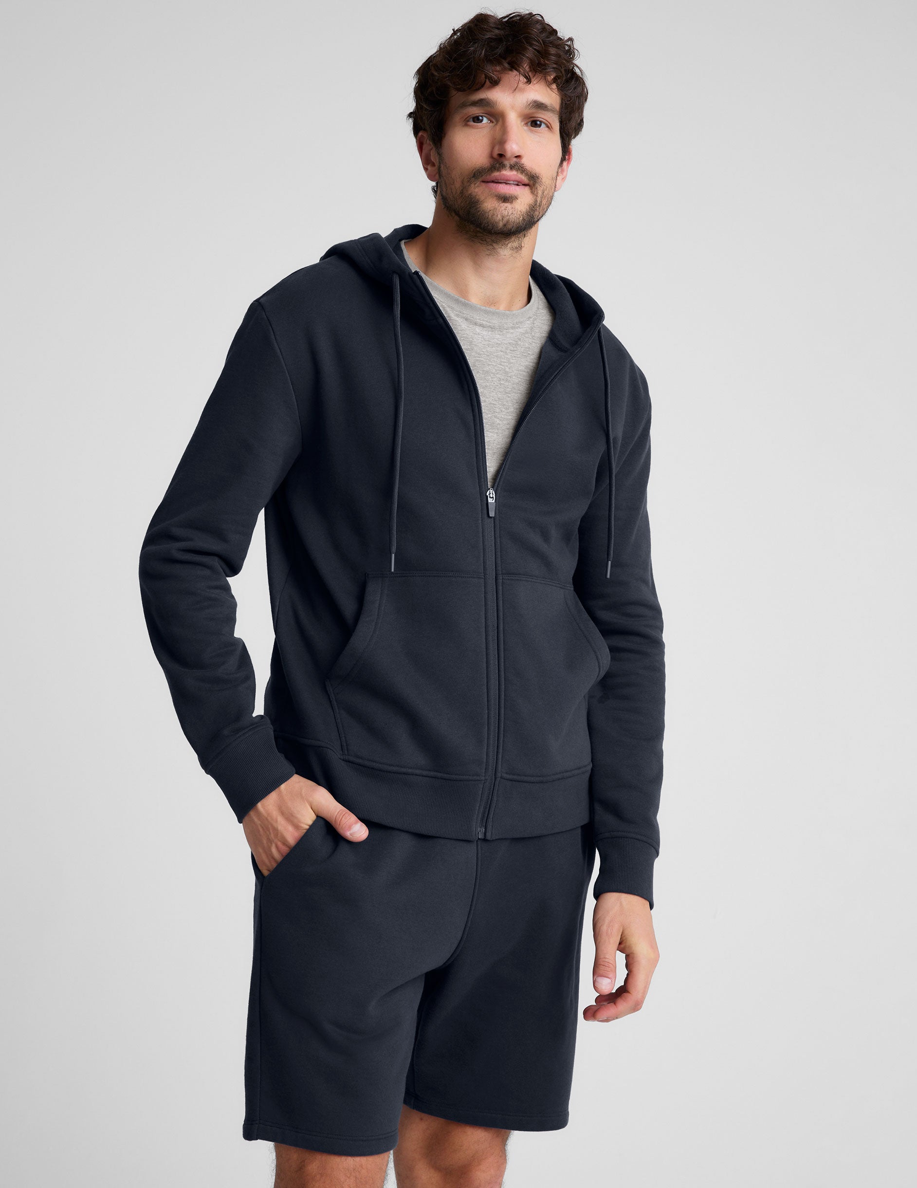 blue mens zip-up jacket with a hoodie.