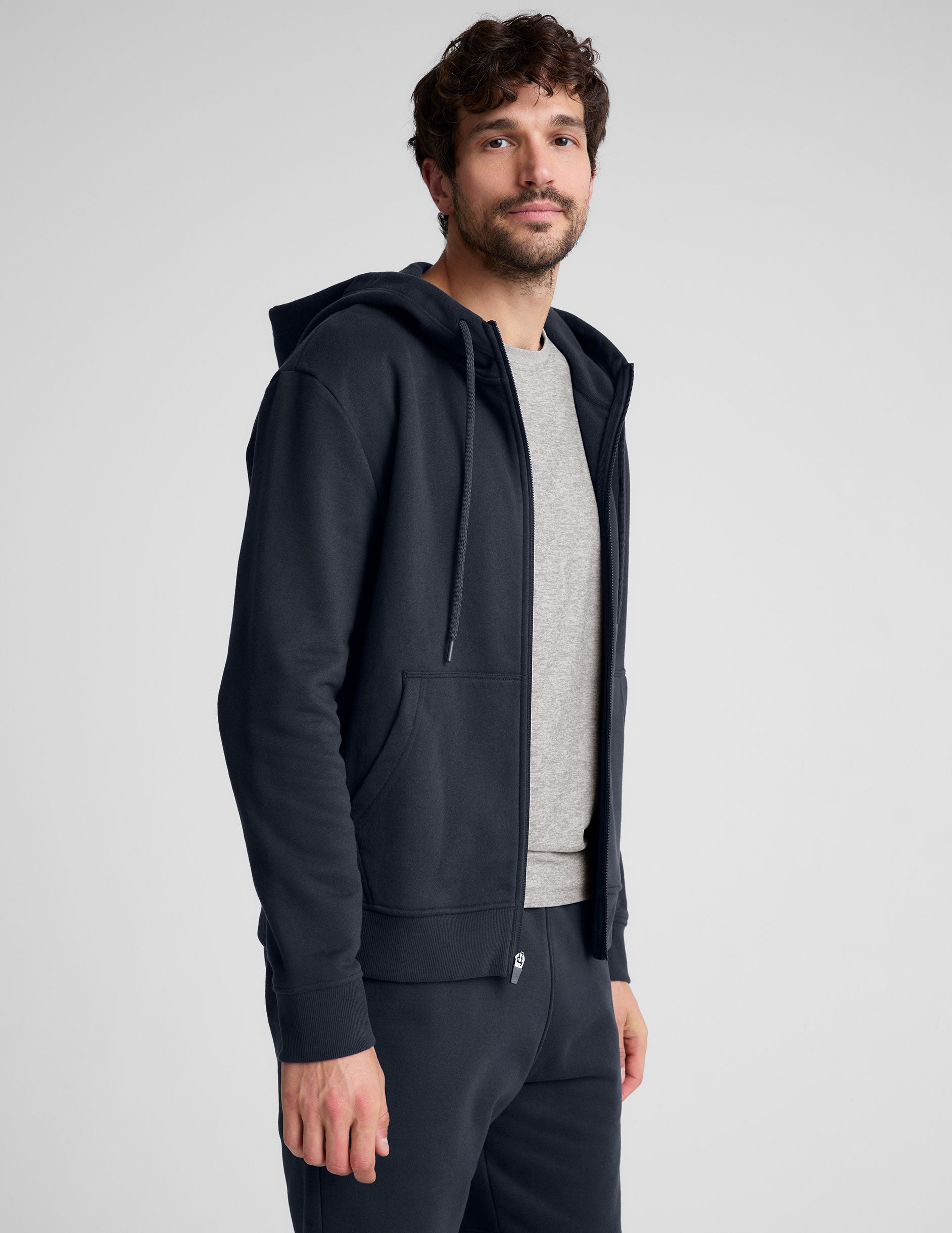 blue mens zip-up jacket with a hoodie.