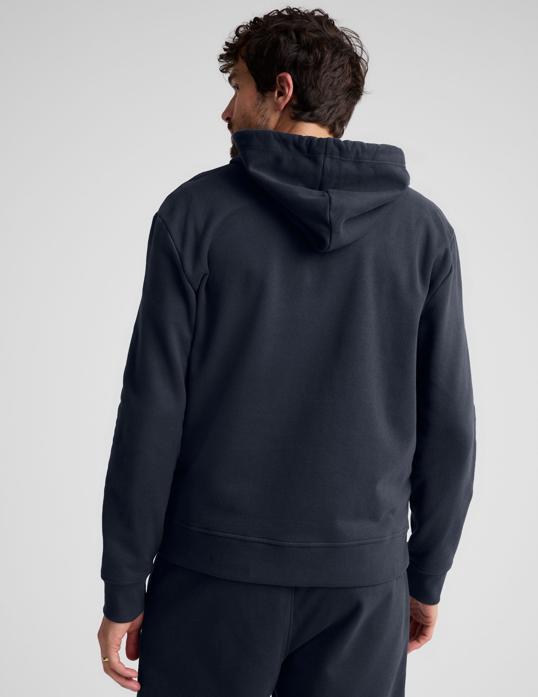 blue mens zip-up jacket with a hoodie.