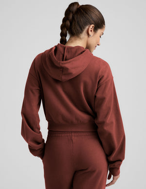 brown fleece zip-up jacket with a drawstring hood. 