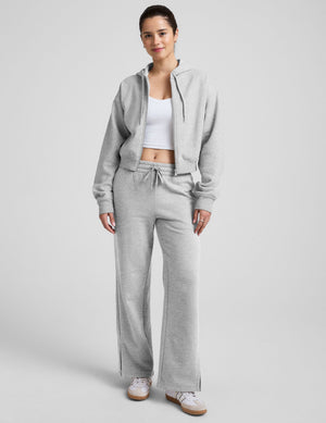 gray fleece zip-up jacket with a drawstring hood. 