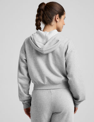 gray fleece zip-up jacket with a drawstring hood. 