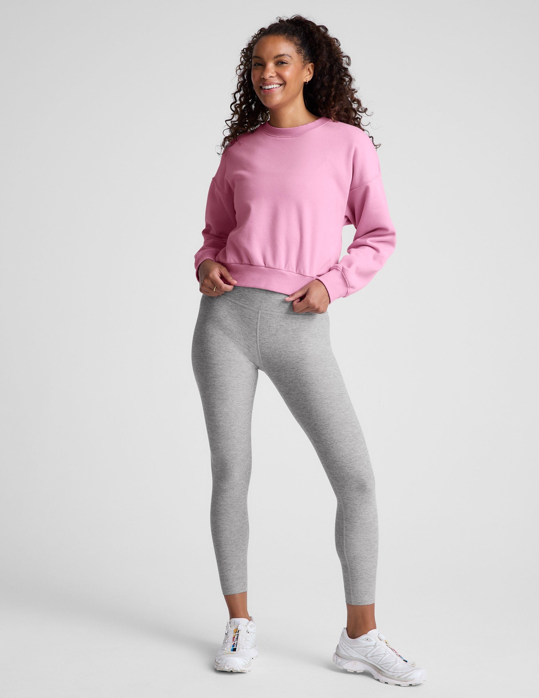 pink crew neck loose-fitting classic length sweatshirt. 