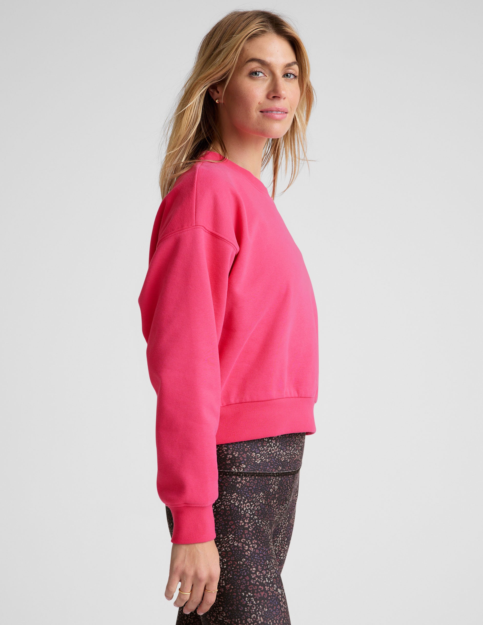 pink crewneck loose-fitting classic length sweatshirt. 