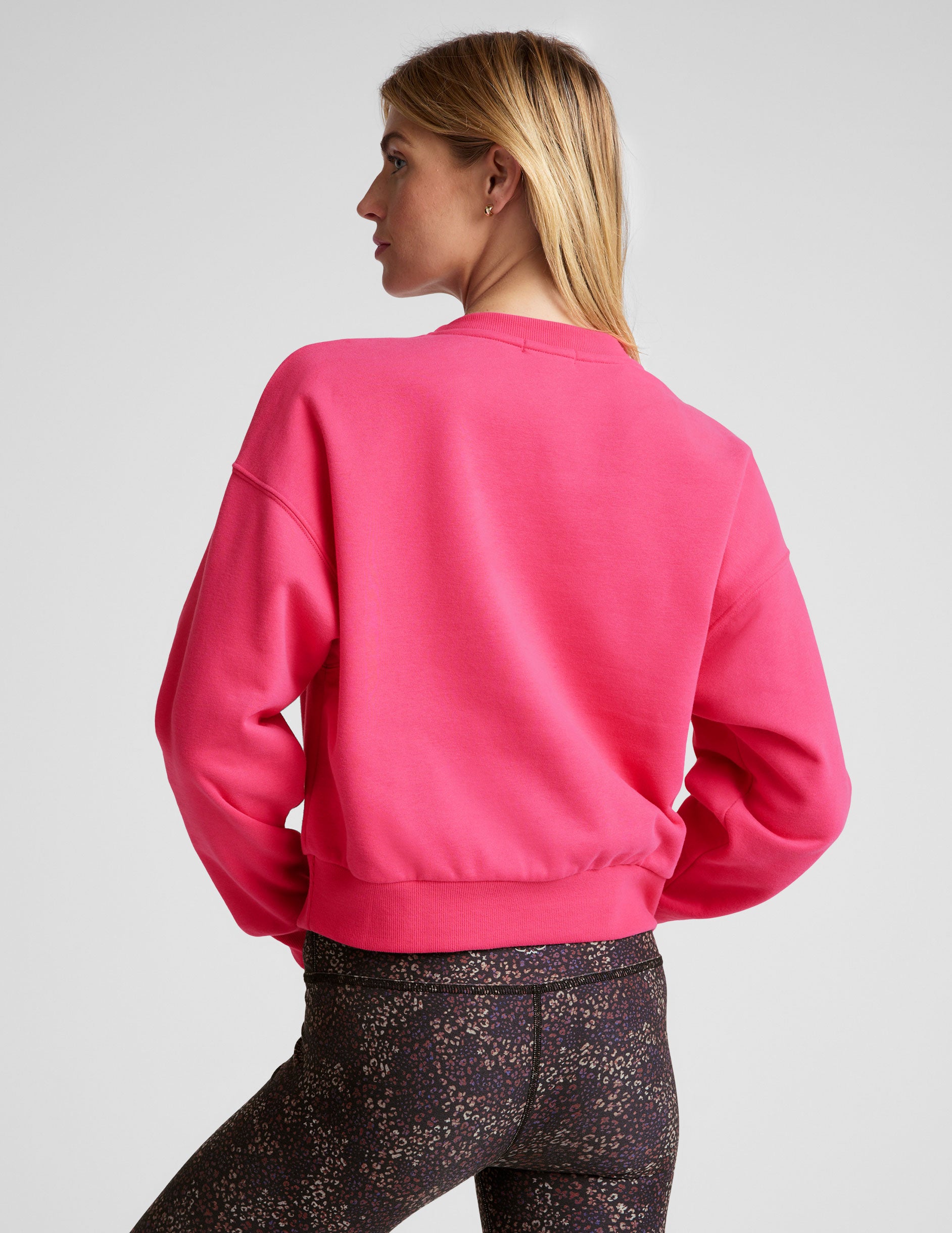 pink crewneck loose-fitting classic length sweatshirt. 