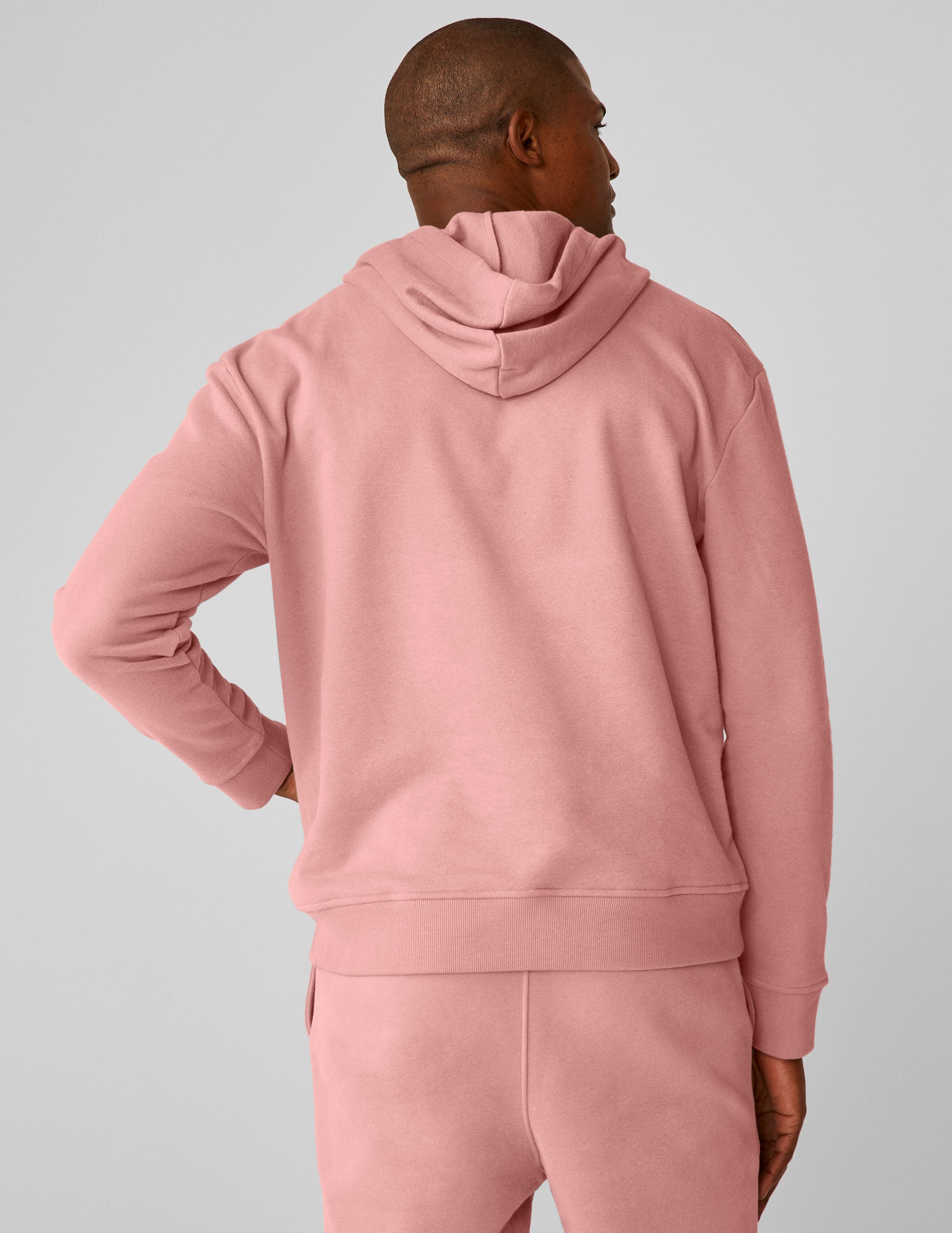 pink men's pullover hoodie with a kangaroo pocket. 