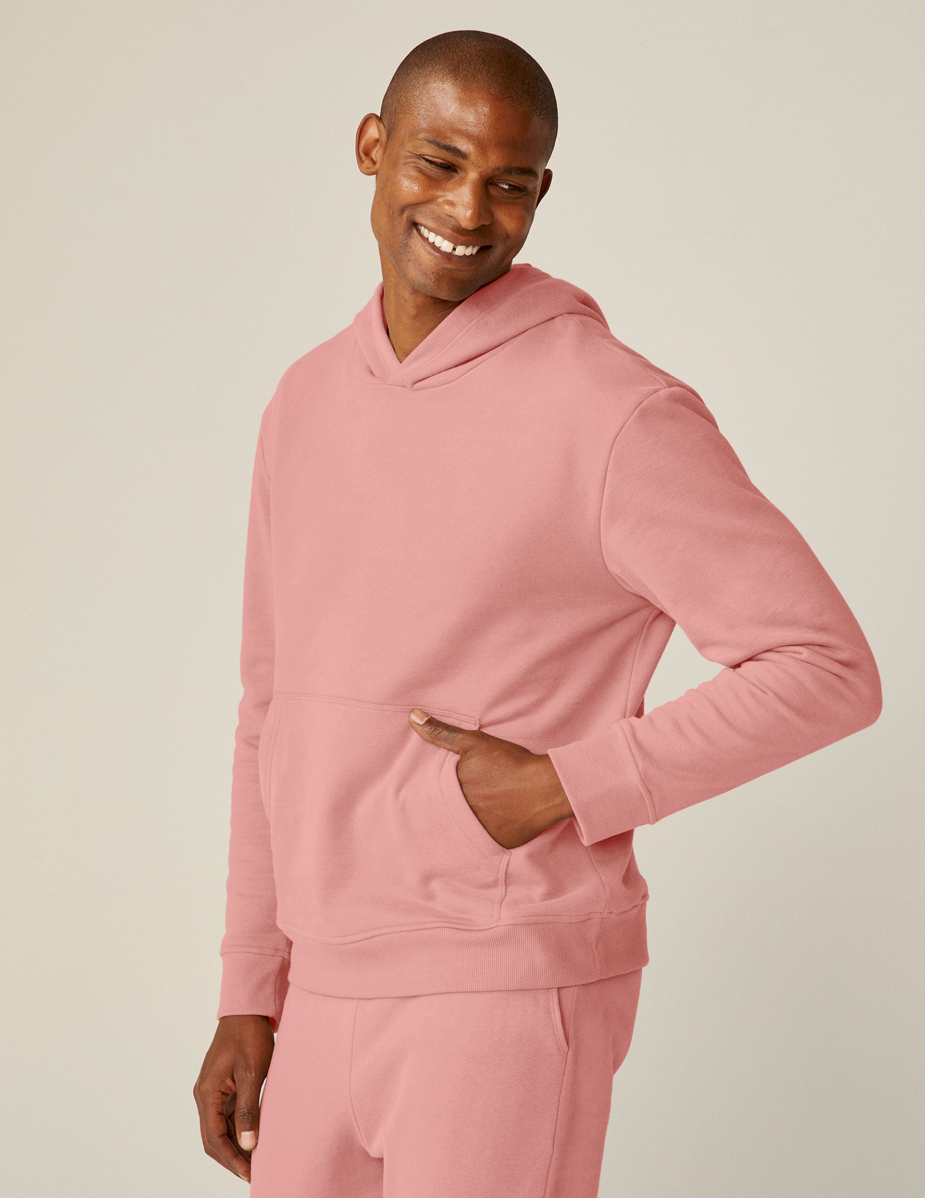 pink men's pullover hoodie with a kangaroo pocket. 