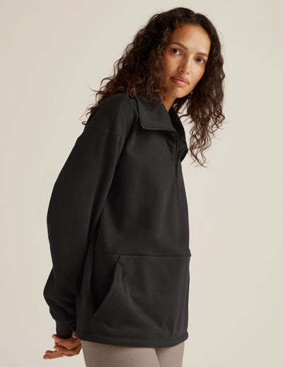 black quarter-zip pullover. 
