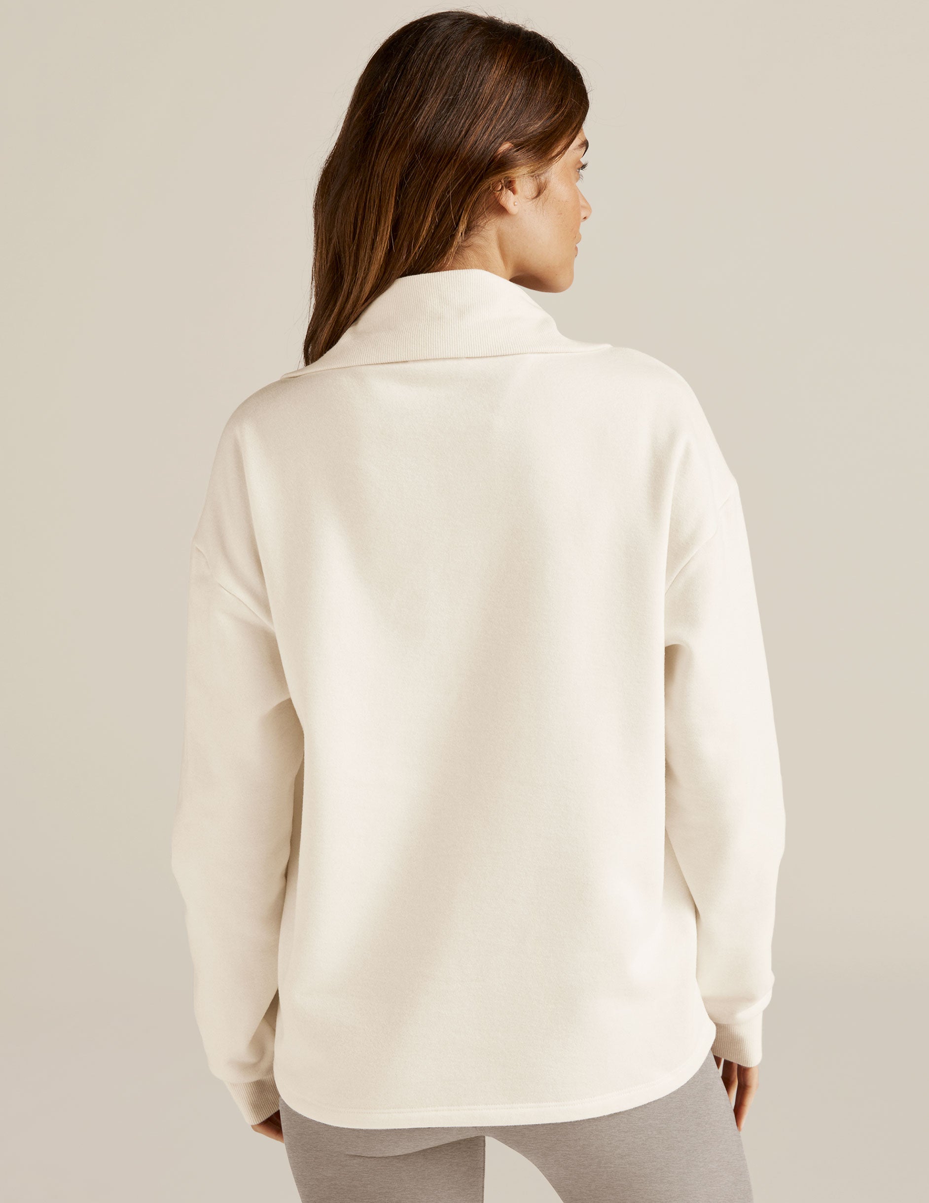 white quarter-zip fleece pullover. 