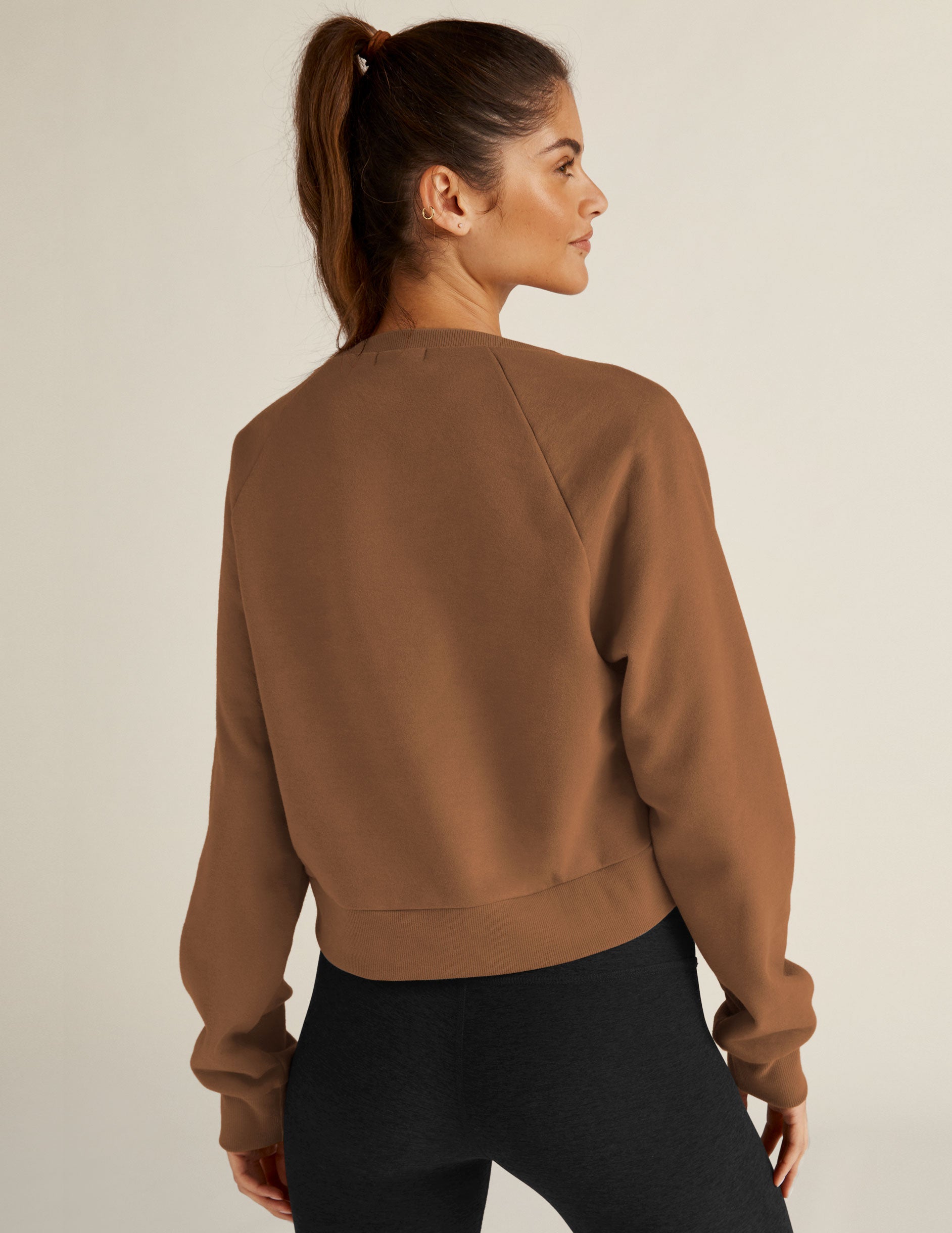 brown relaxed fit pullover sweater with a high-low center front. 