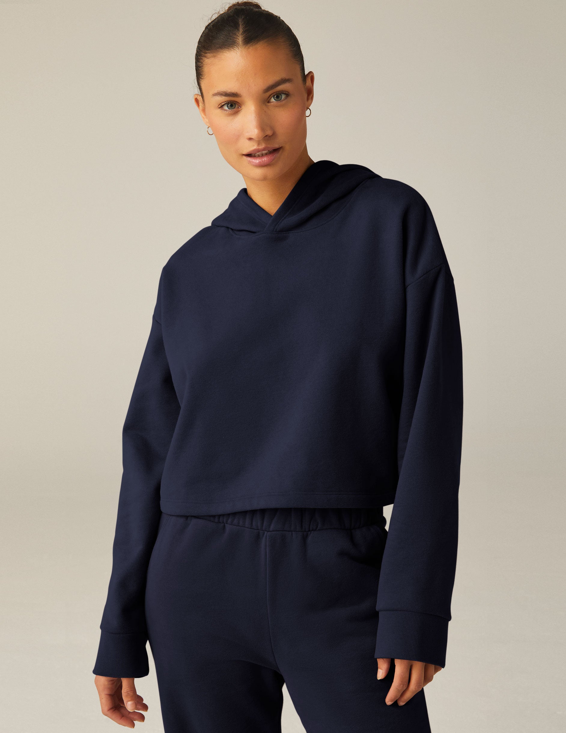 blue cropped hooded pullover. 