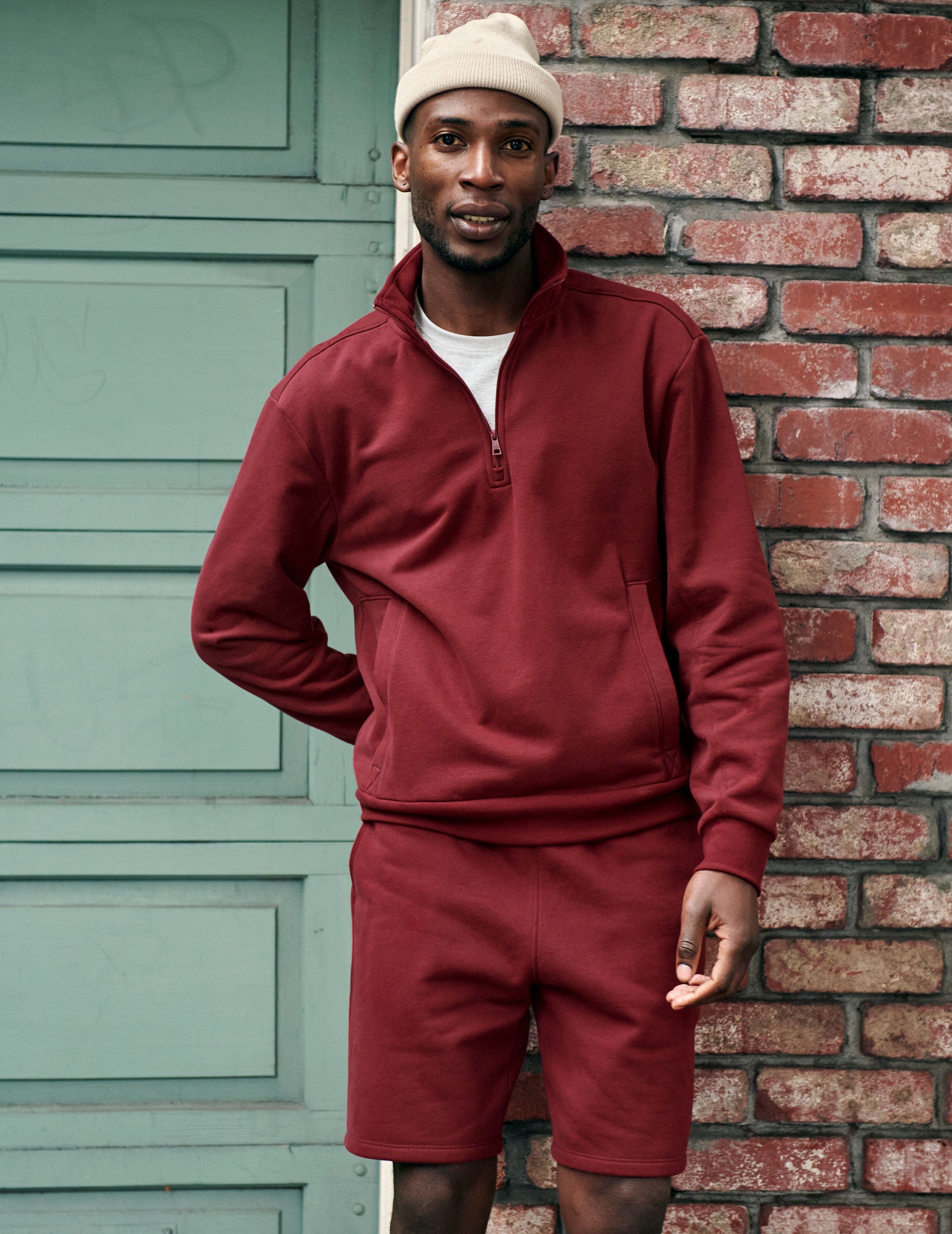 red men's quarter zip pullover with a kangaroo pocket. 