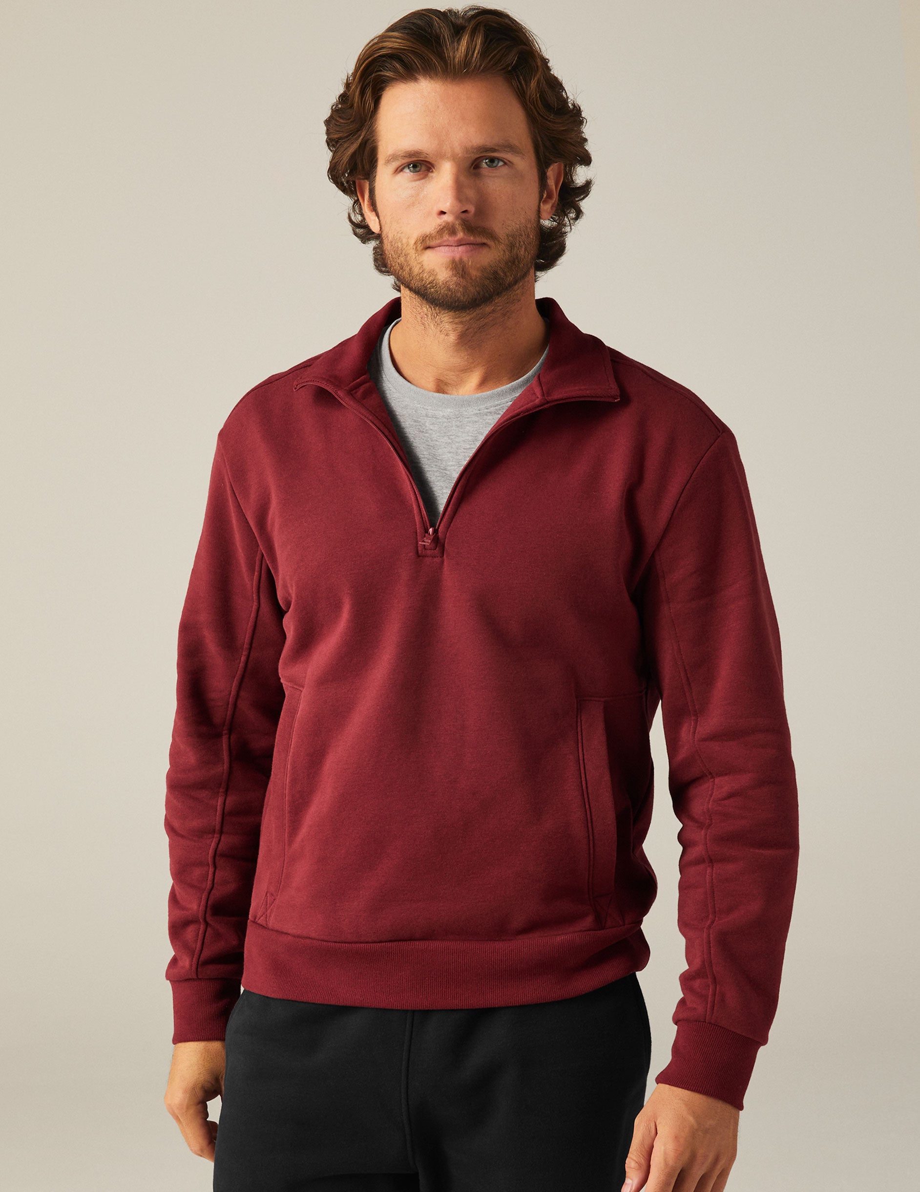 red men's quarter zip pullover with a kangaroo pocket. 