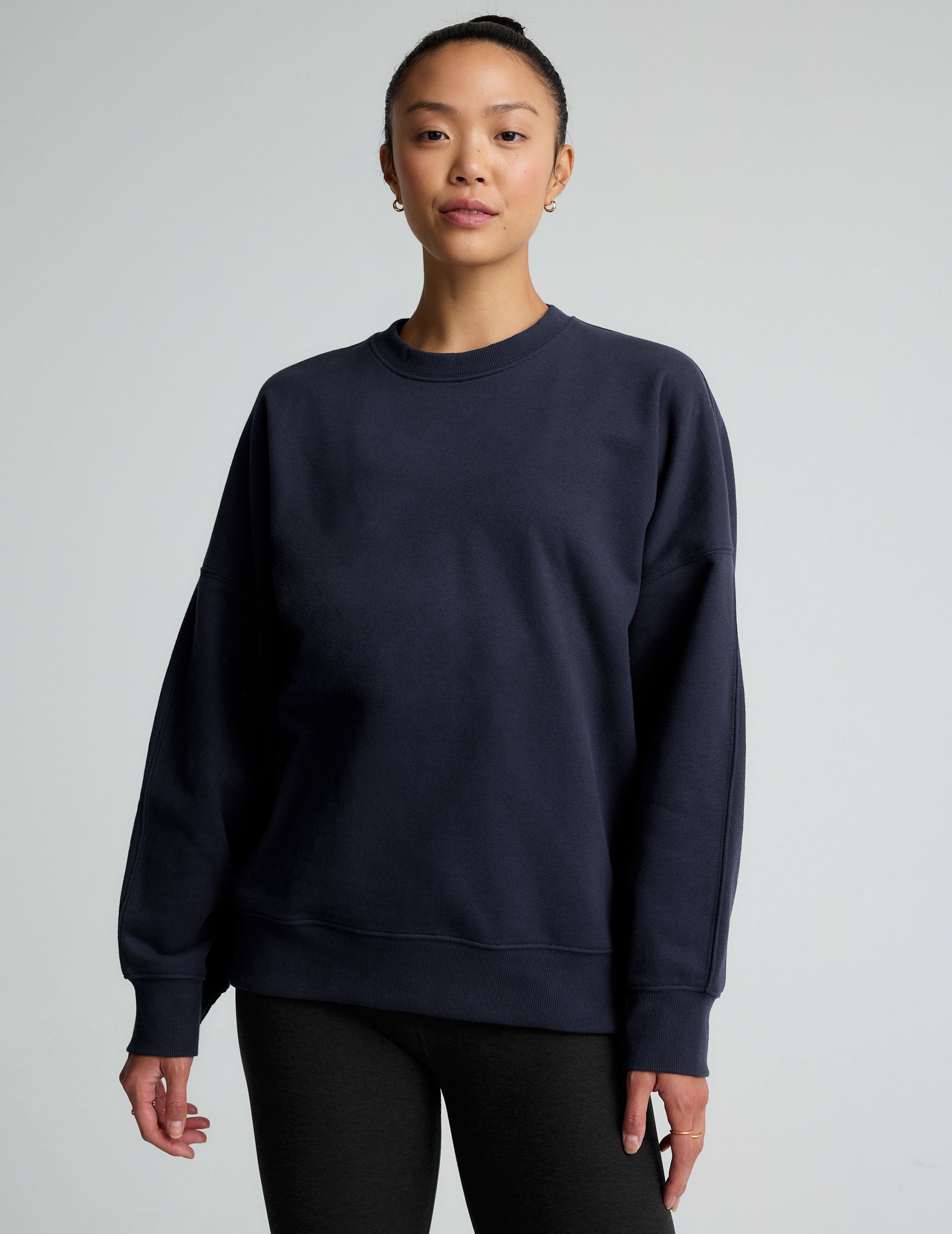 blue crew neck sweatshirt.