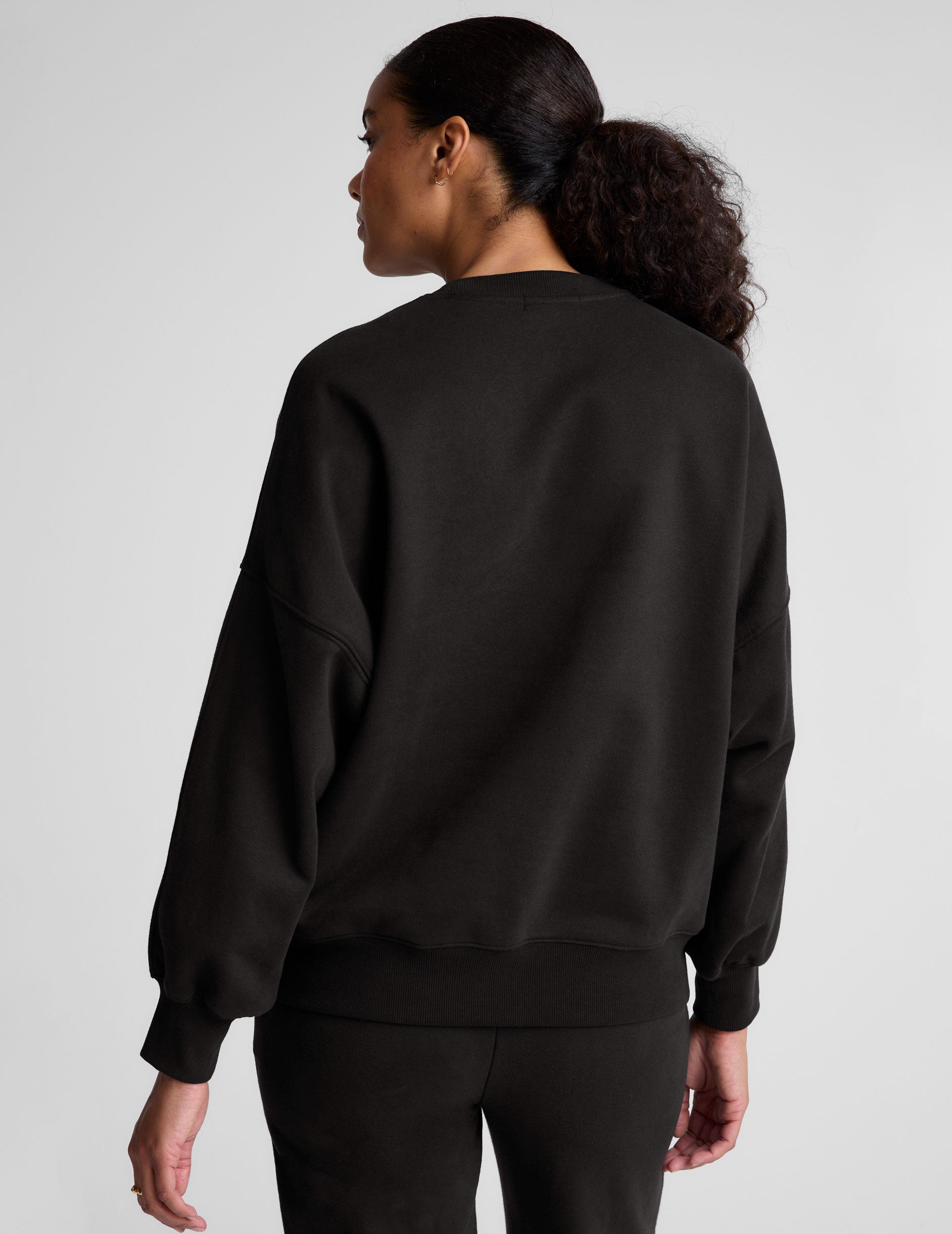 black crew neck sweatshirt.