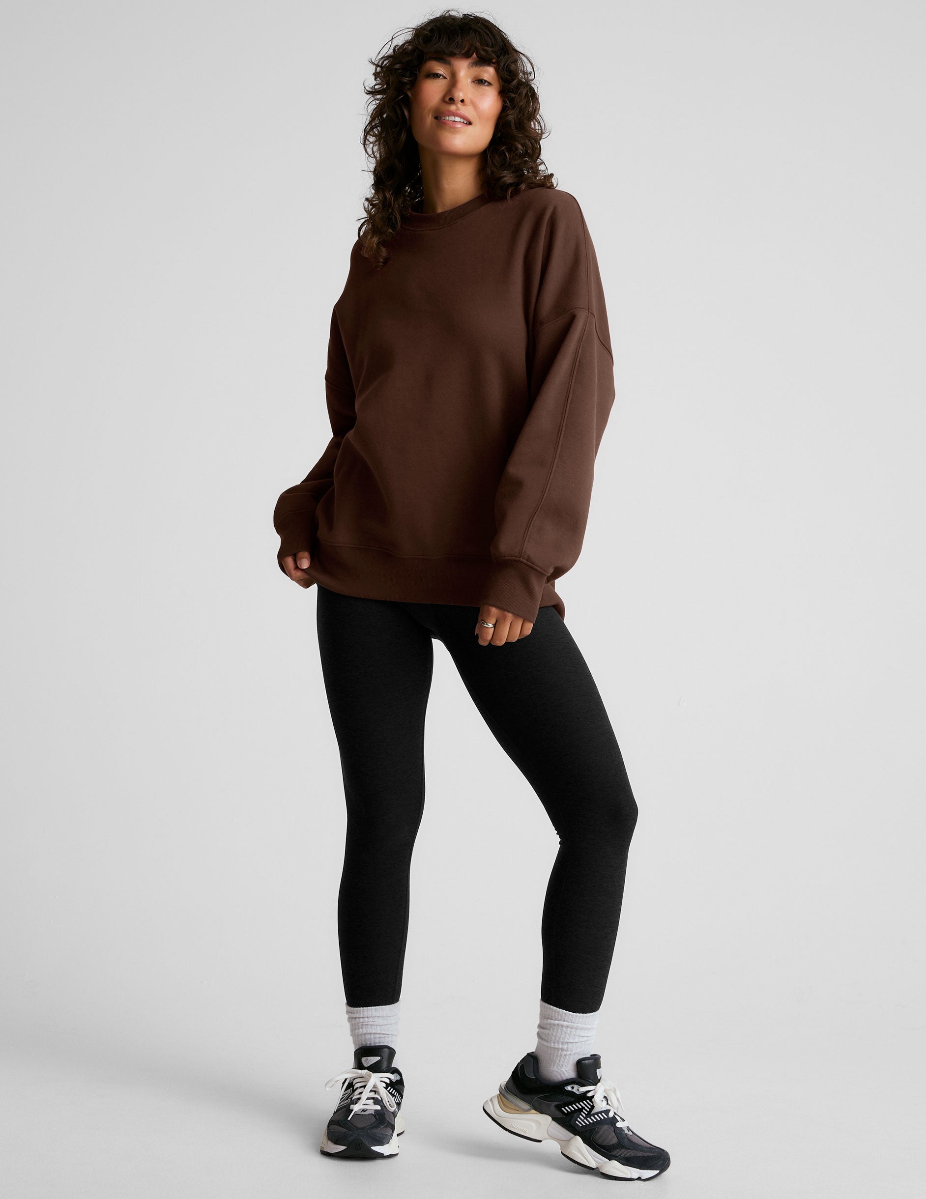 brown crew neck sweatshirt.