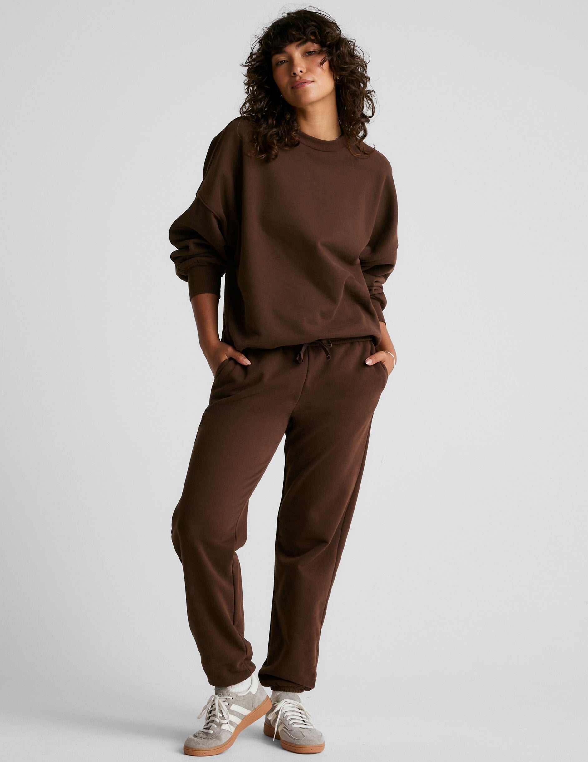 brown crew neck sweatshirt.