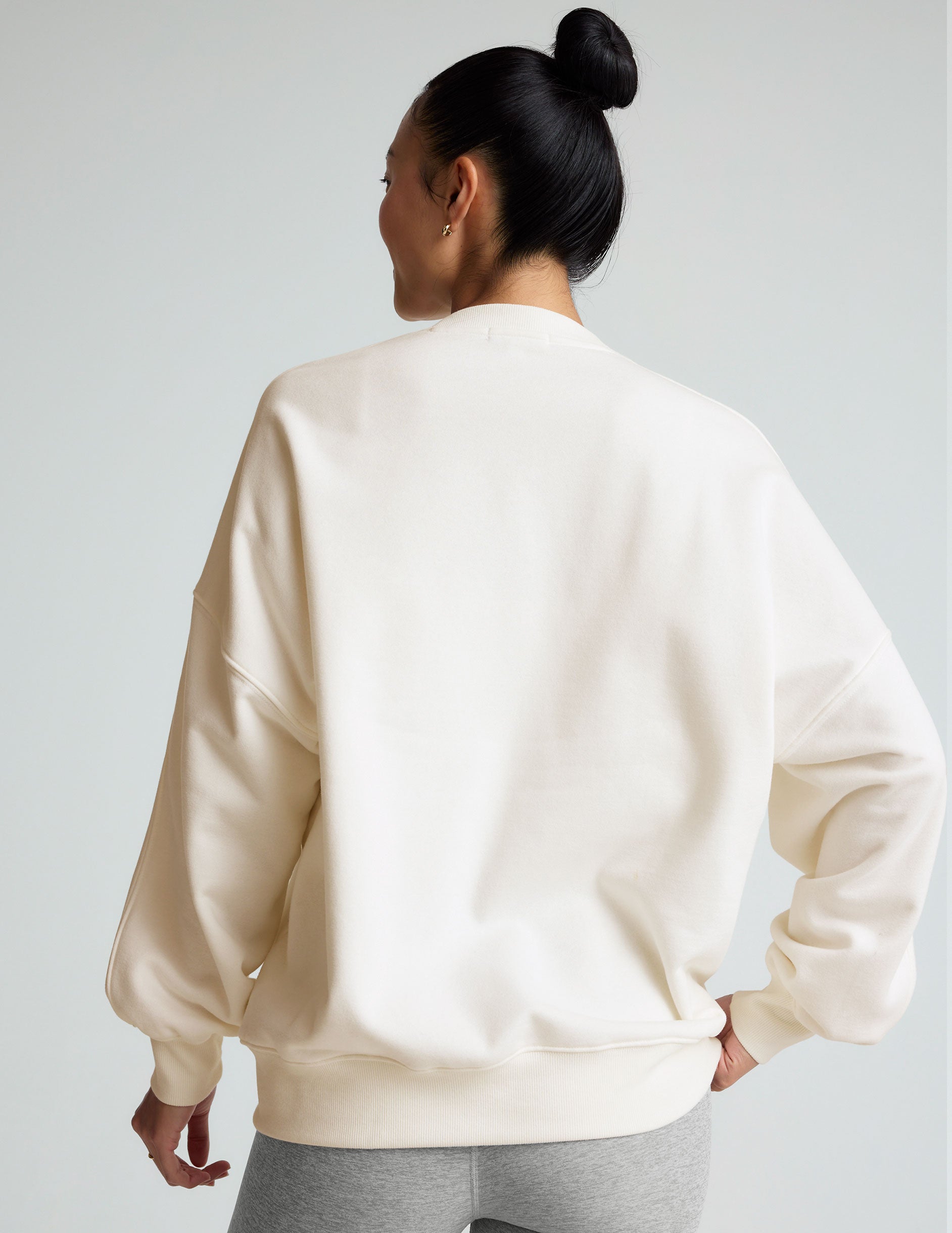 white crew neck sweatshirt.