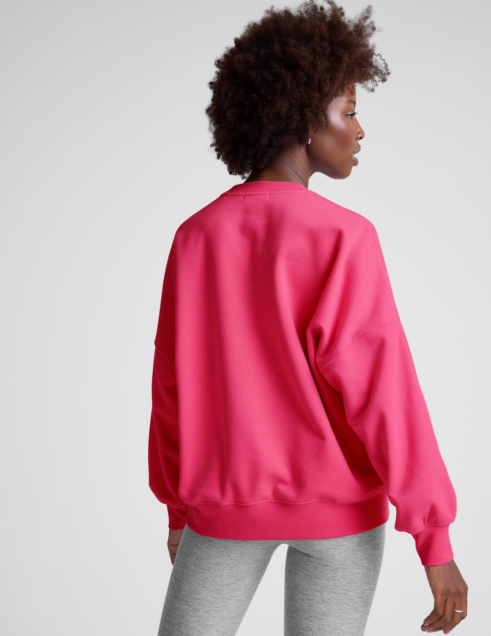 pink oversized crewneck sweatshirt. 