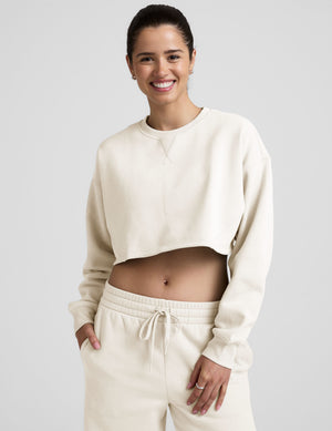 white cropped crew neck loose fitting sweatshirt. 