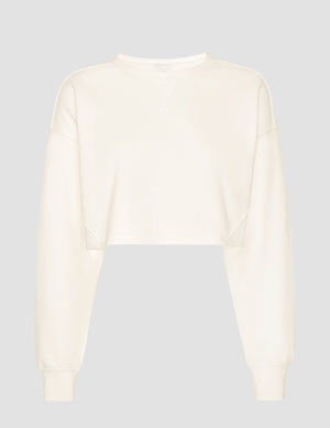 white cropped crew neck loose fitting sweatshirt. 