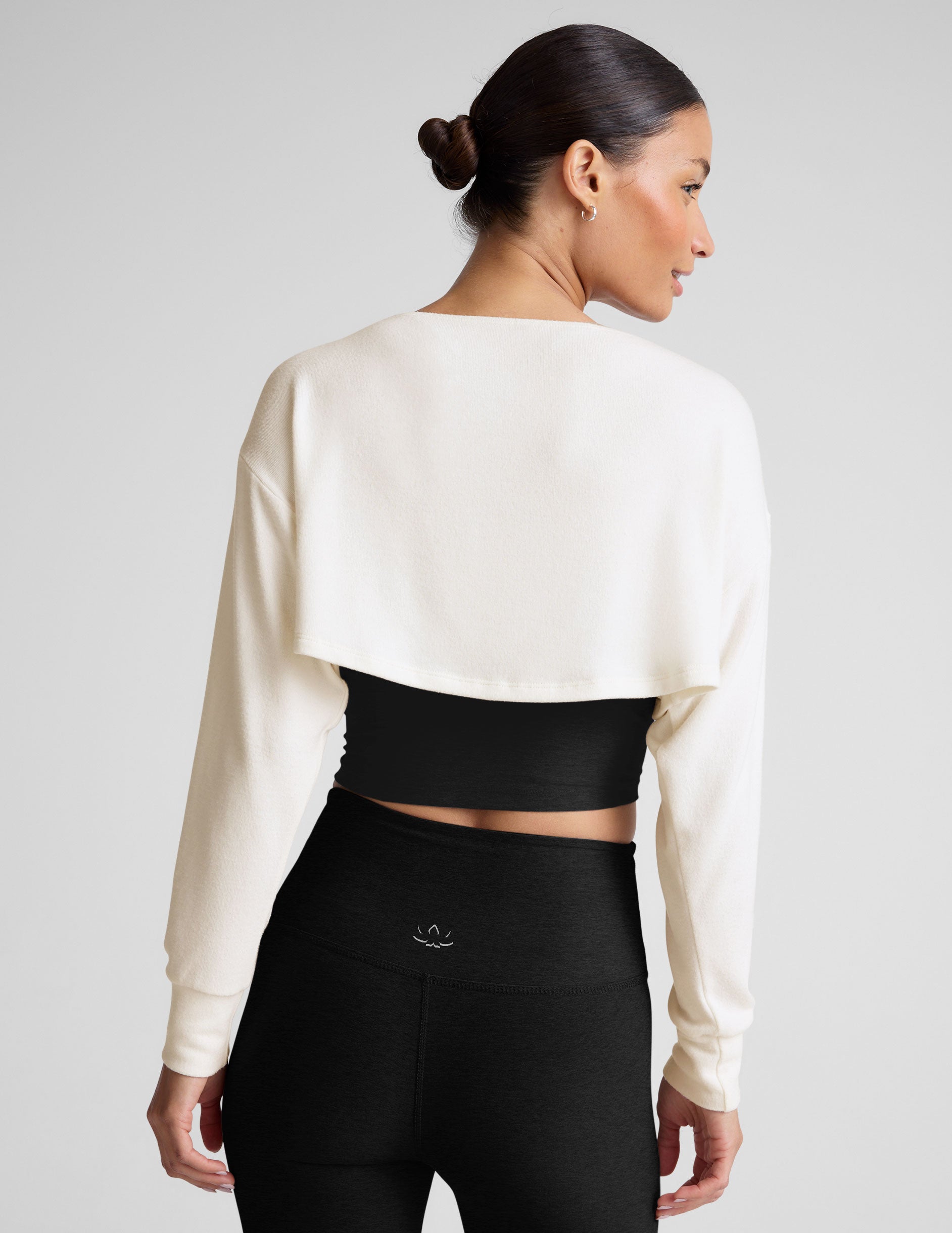 white off the shoulder two way long sleeve shrug. 