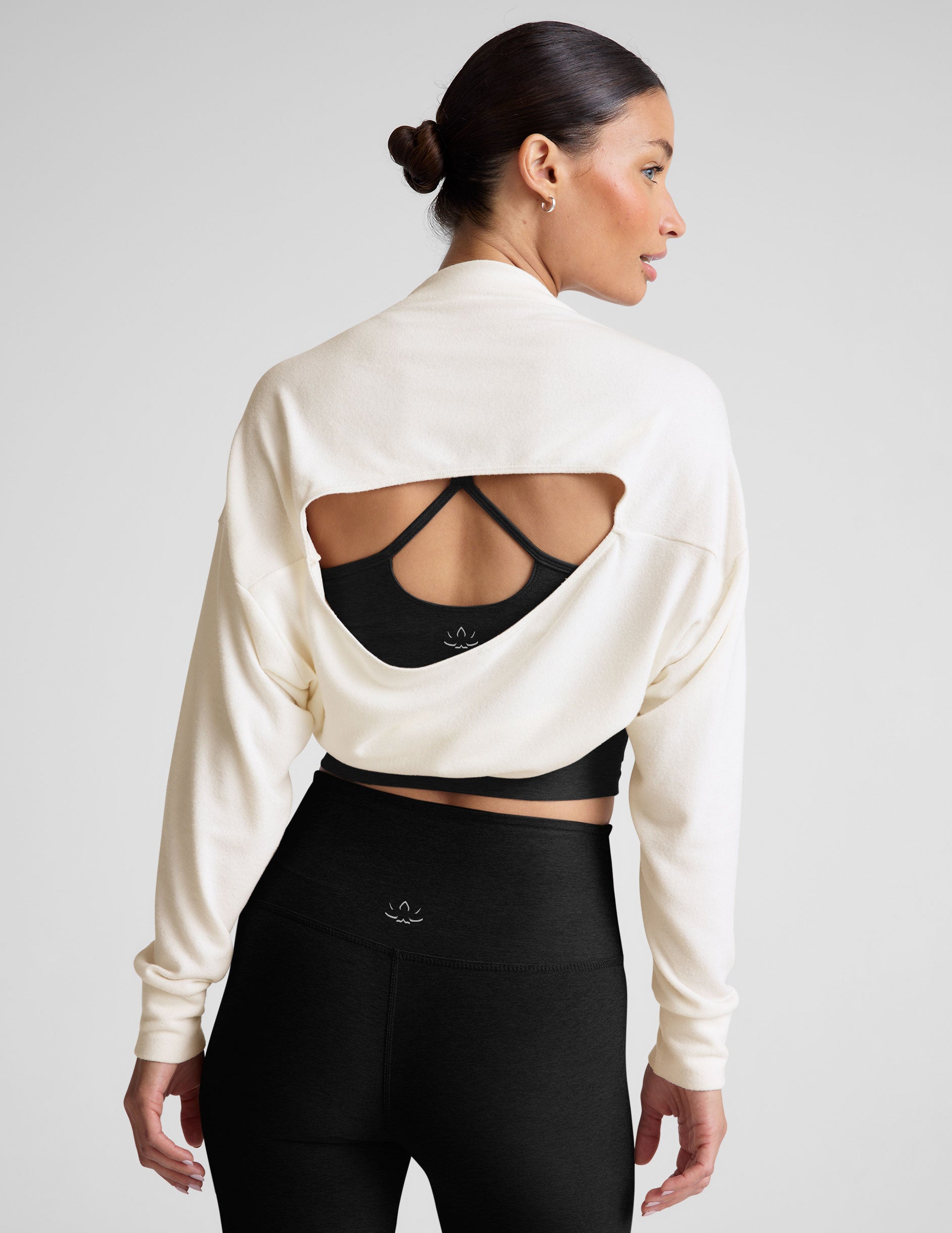 white off the shoulder two way long sleeve shrug. 