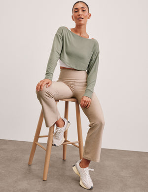 green 2-way long sleeve cropped shrug. 