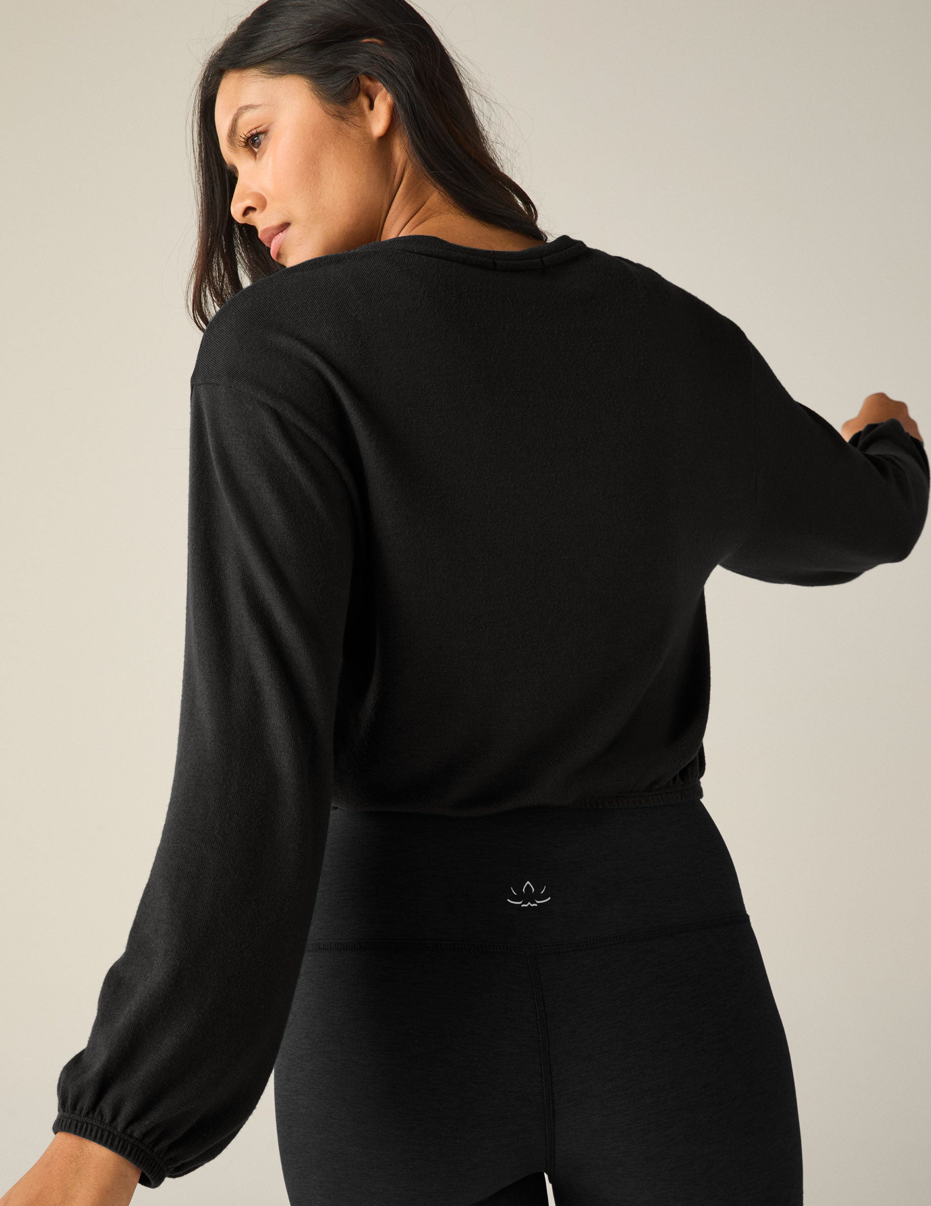 black v-neck pullover.