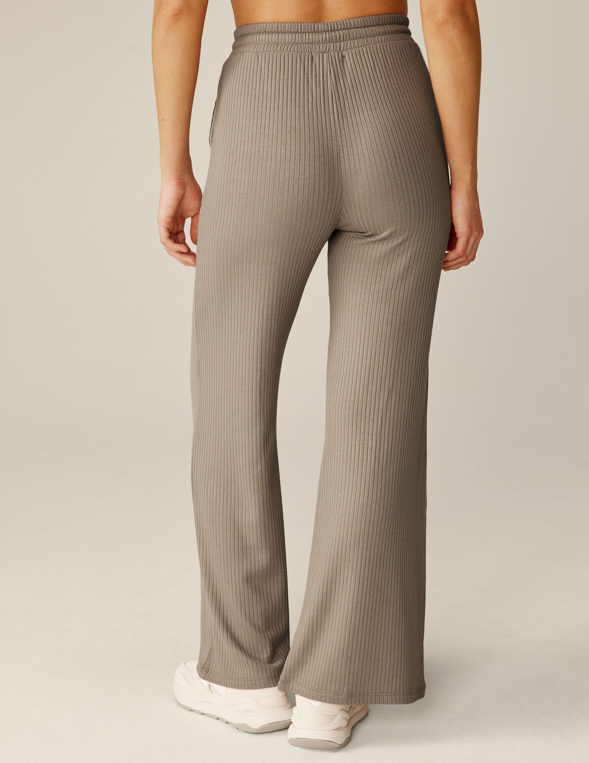 brown high-rise ribbed wide leg pants with a drawstring. 