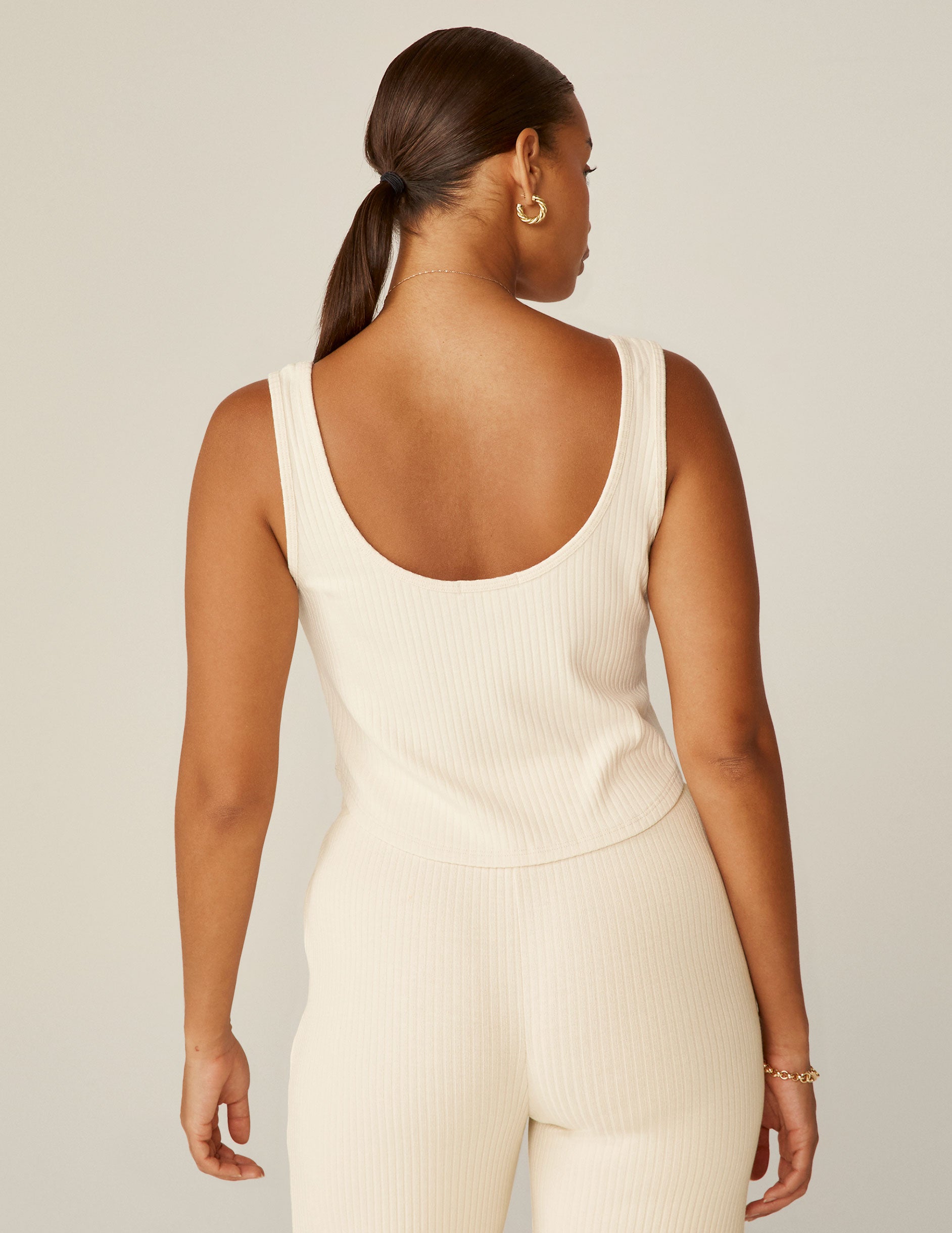 white scoop neck ribbed tank top. 