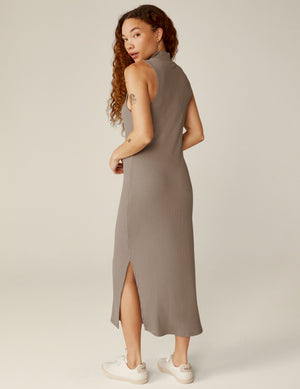 brown mock neck ribbed midi dress with a front side slit. 