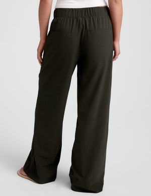 green mid rise pants with front and side pockets. 