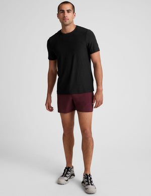 Front view of a man wearing maroon Pivotal 2.0 Men's Short 5