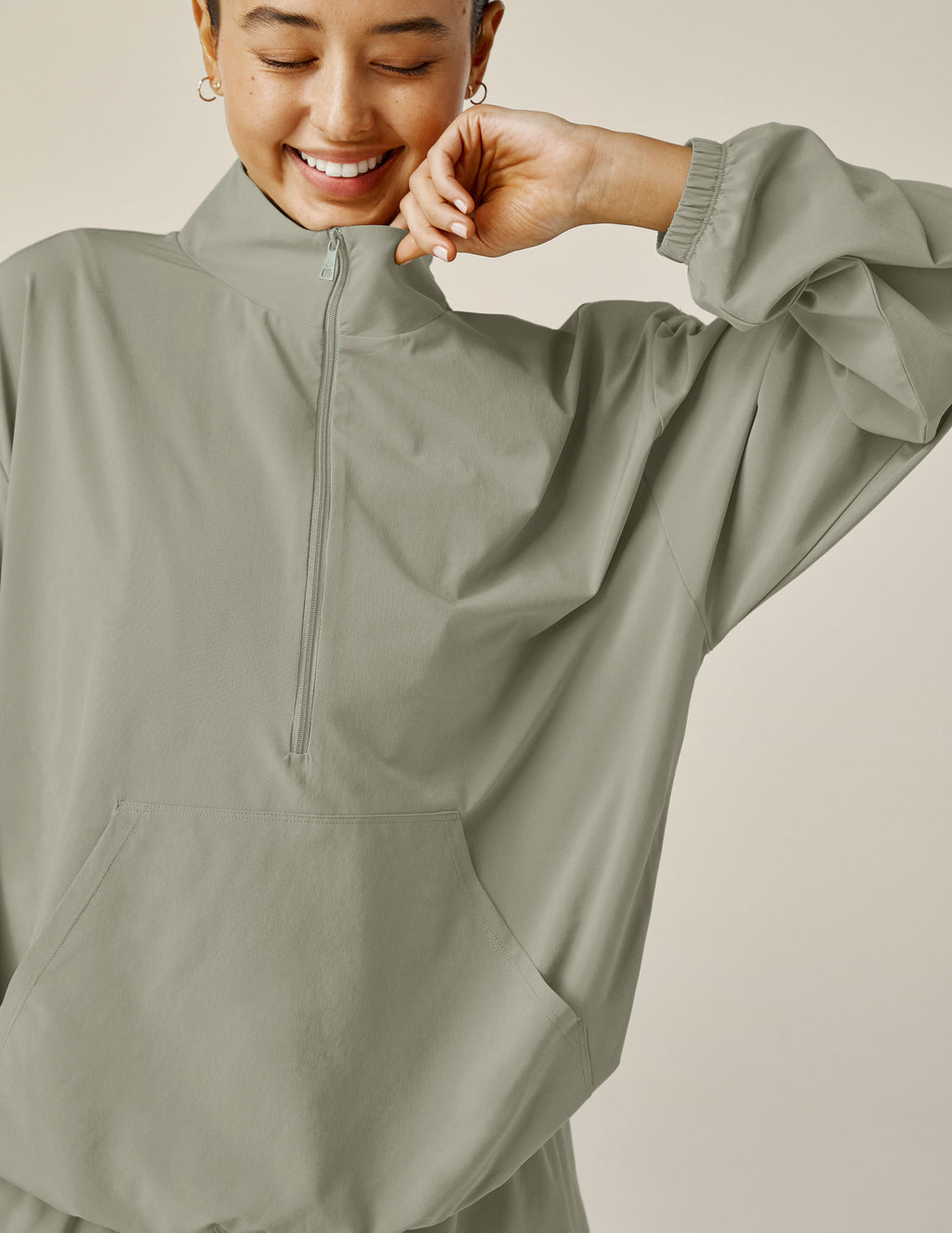 Stretch Woven In Stride Half Zip Pullover Featured Image