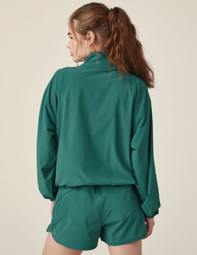 green pullover quarter zip jacket