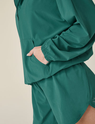 green pullover quarter zip jacket