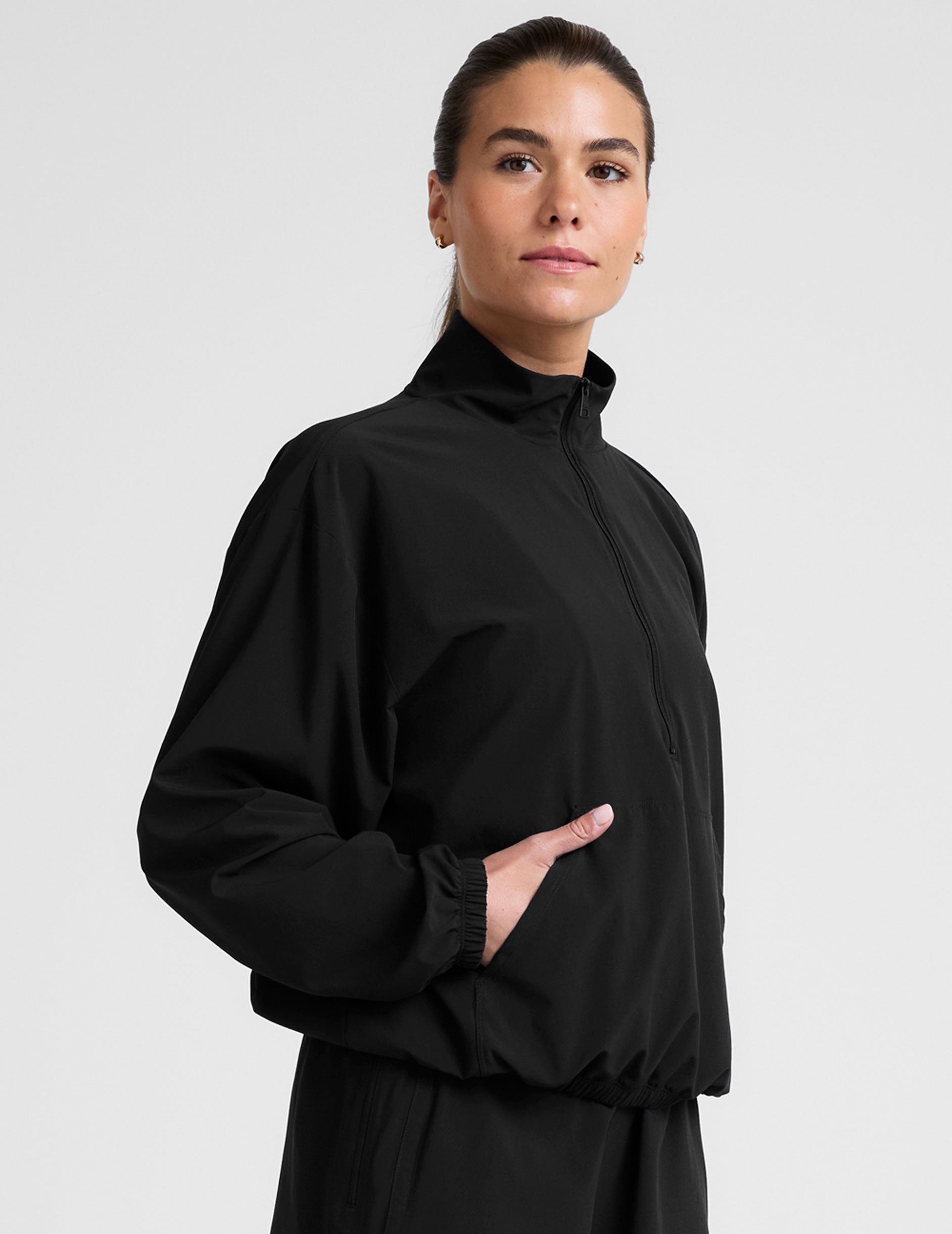 Stretch Woven In Stride Half Zip Pullover