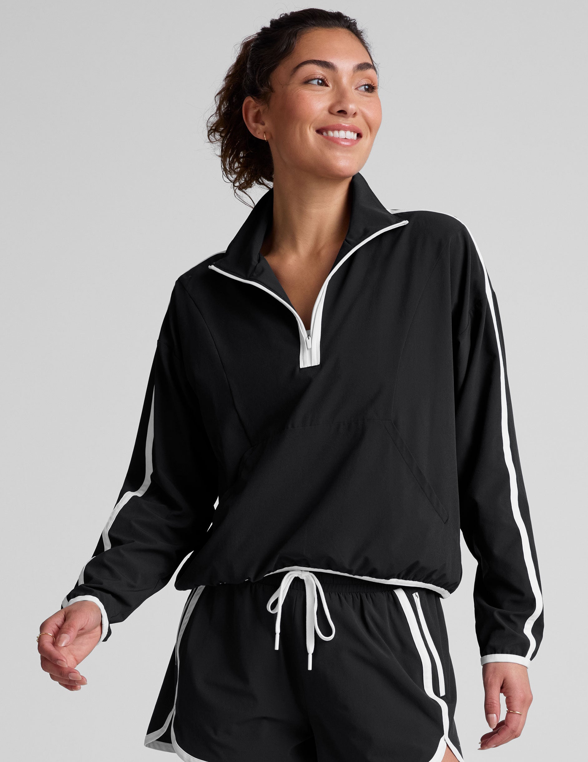 black and white half zip jacket