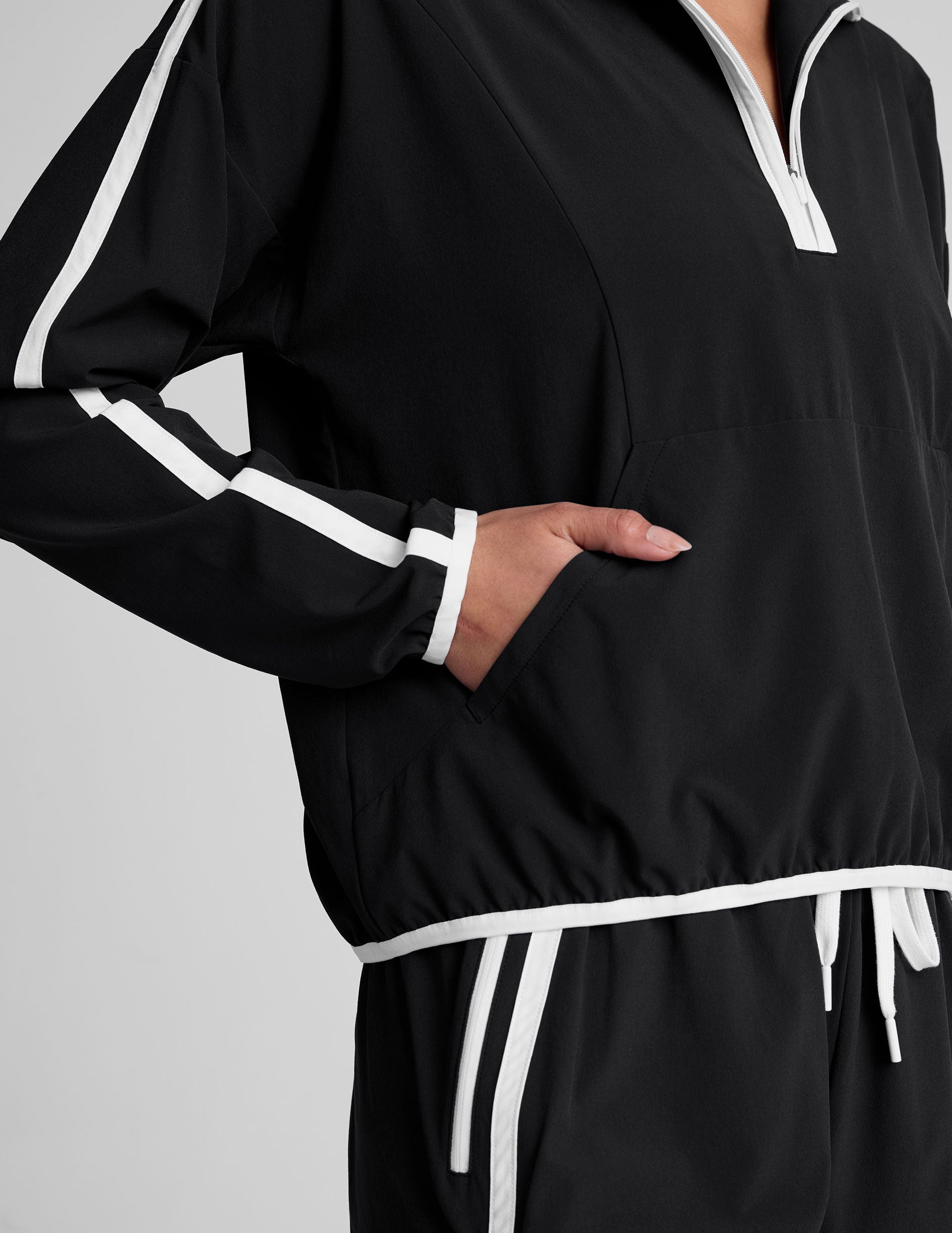 black and white half zip jacket