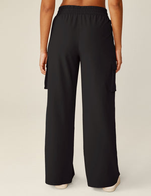 Back view of the black City Chic Cargo Pant showing the elastic waistband, side cargo pockets, and wide-leg silhouette.