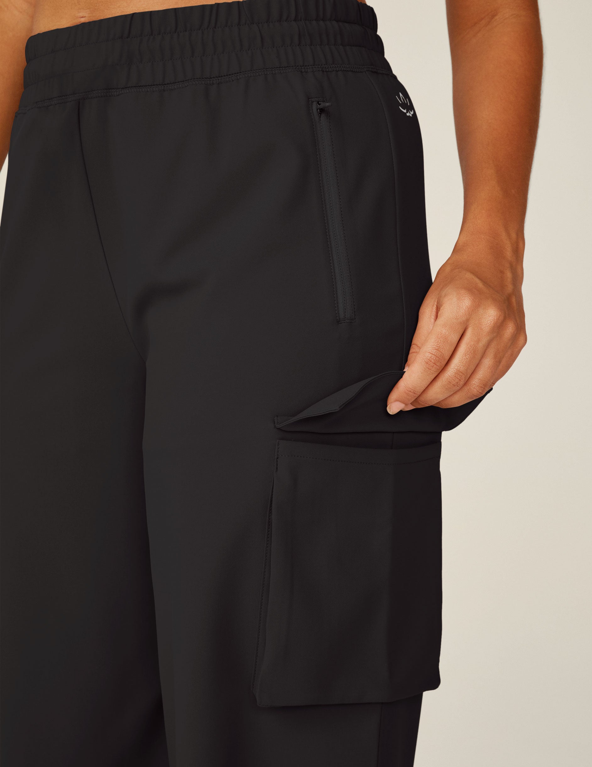 black cargo style pants with pockets. 
