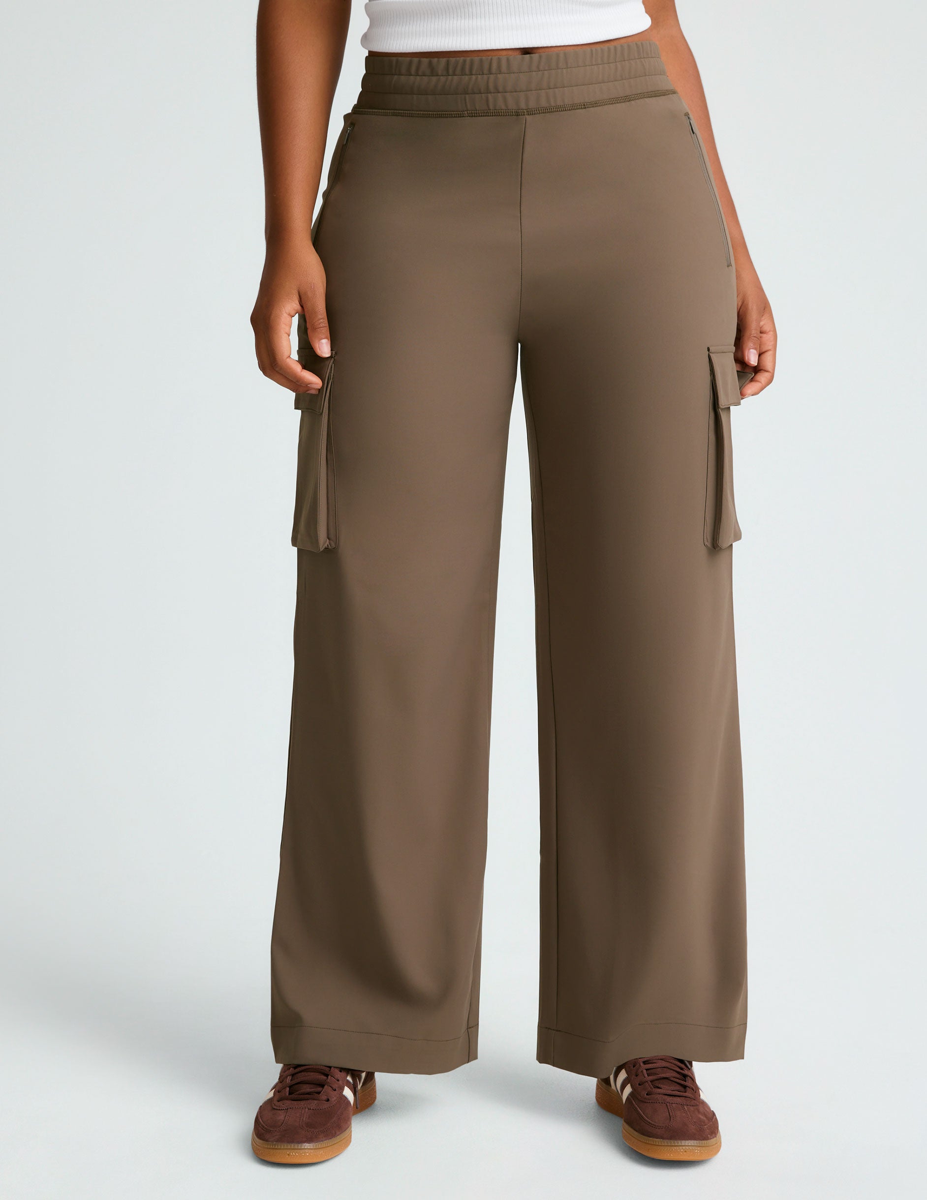 brown cargo style high-waisted pants with pockets.