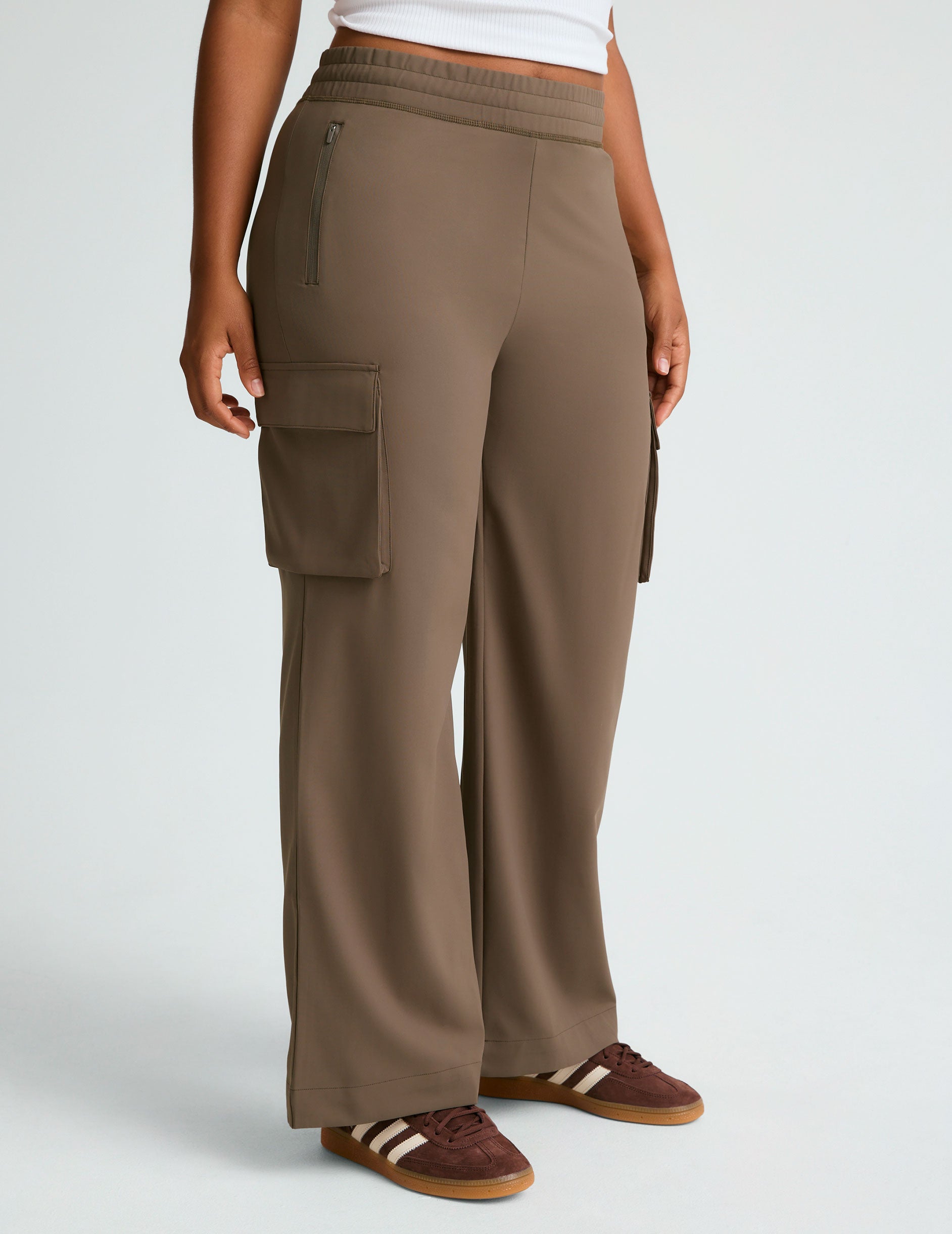 brown cargo style high-waisted pants with pockets.