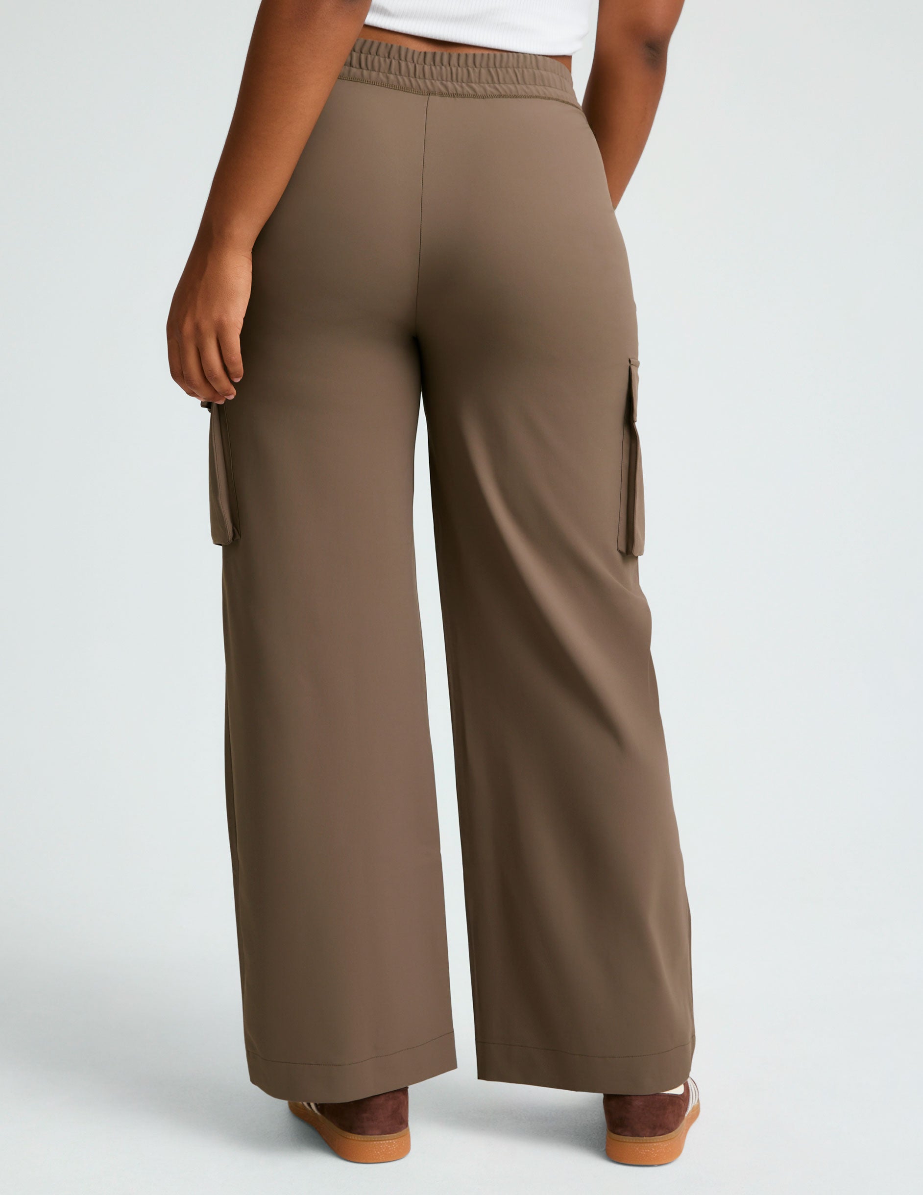 brown cargo style high-waisted pants with pockets.