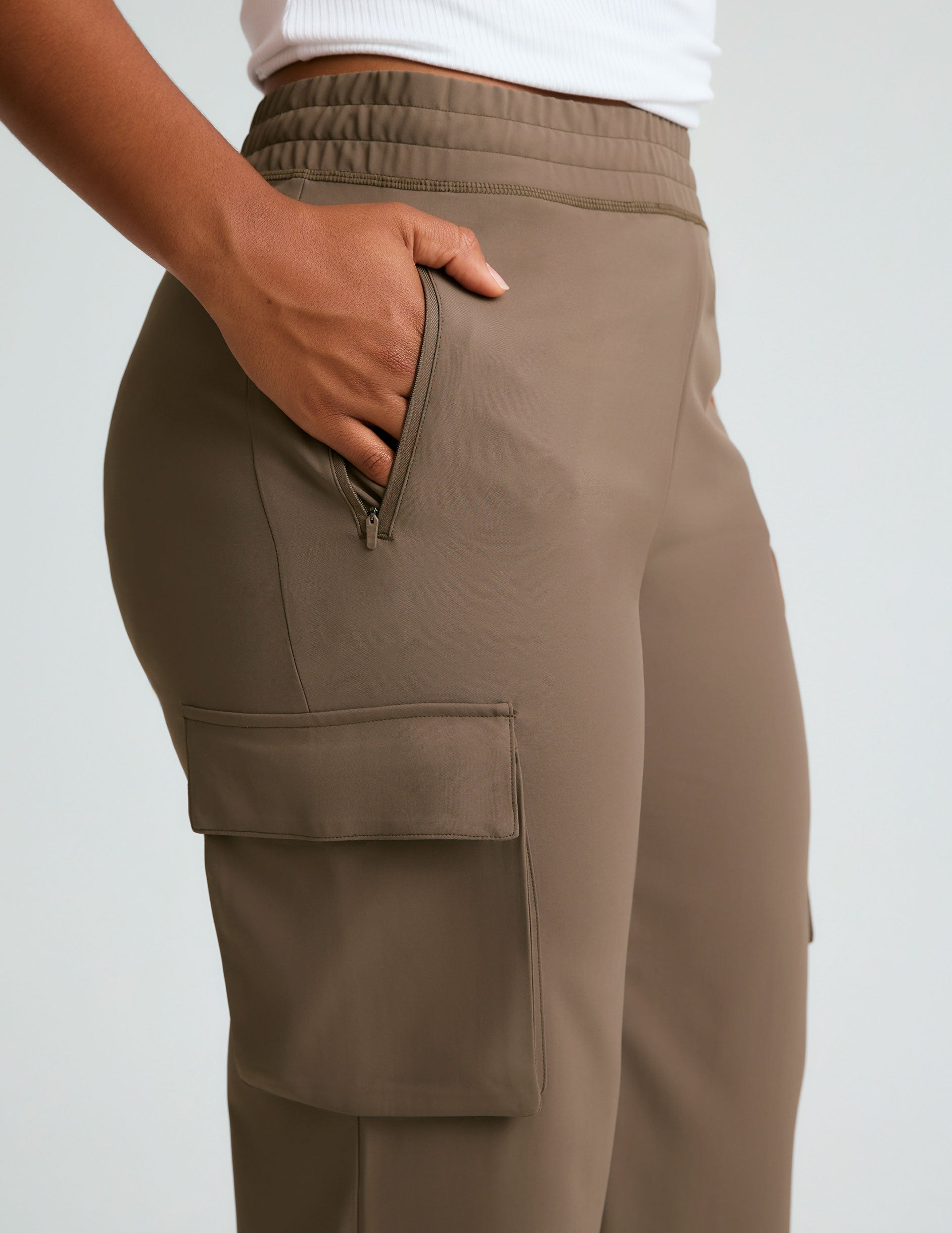 brown cargo style high-waisted pants with pockets.