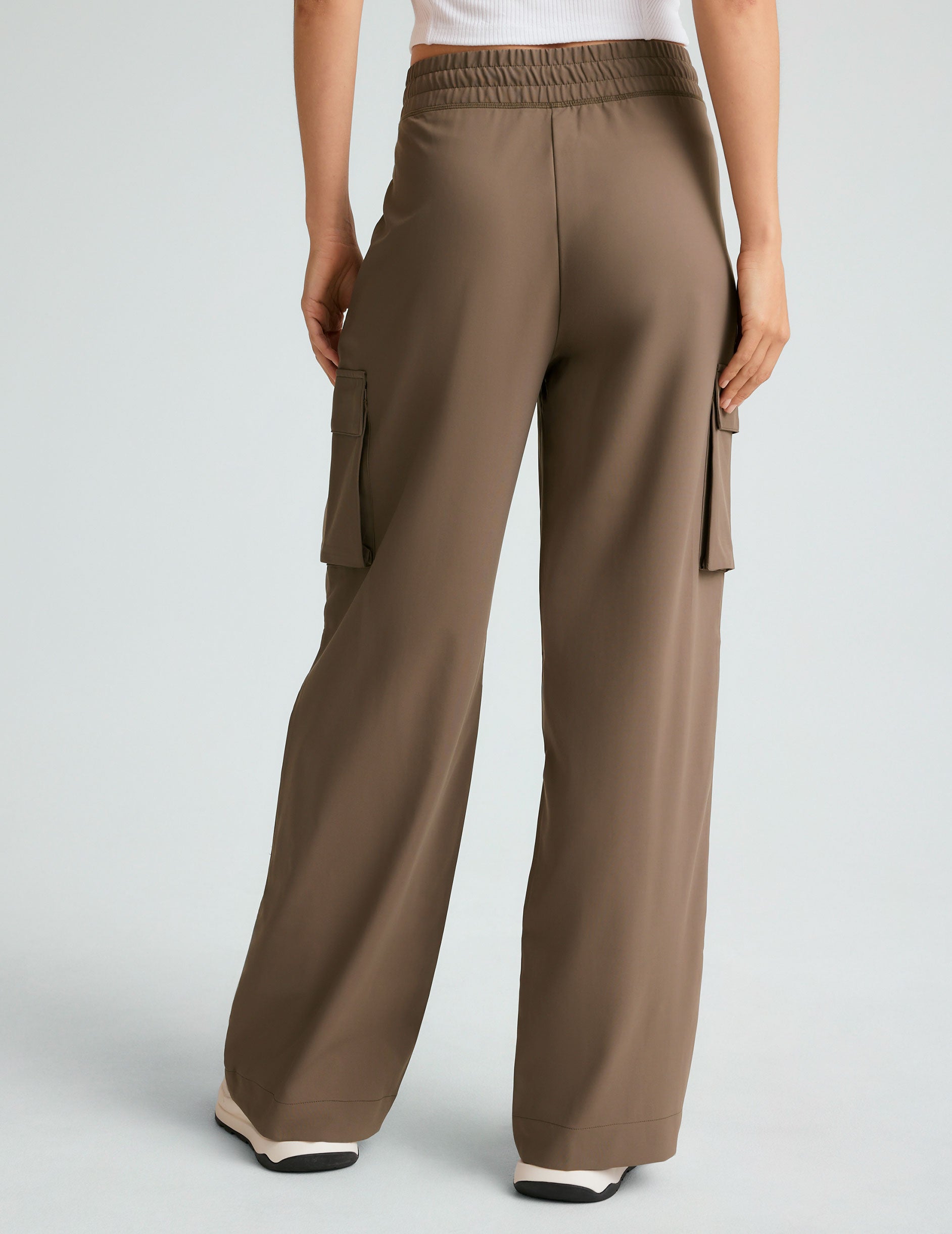 brown cargo style high-waisted pants with pockets.