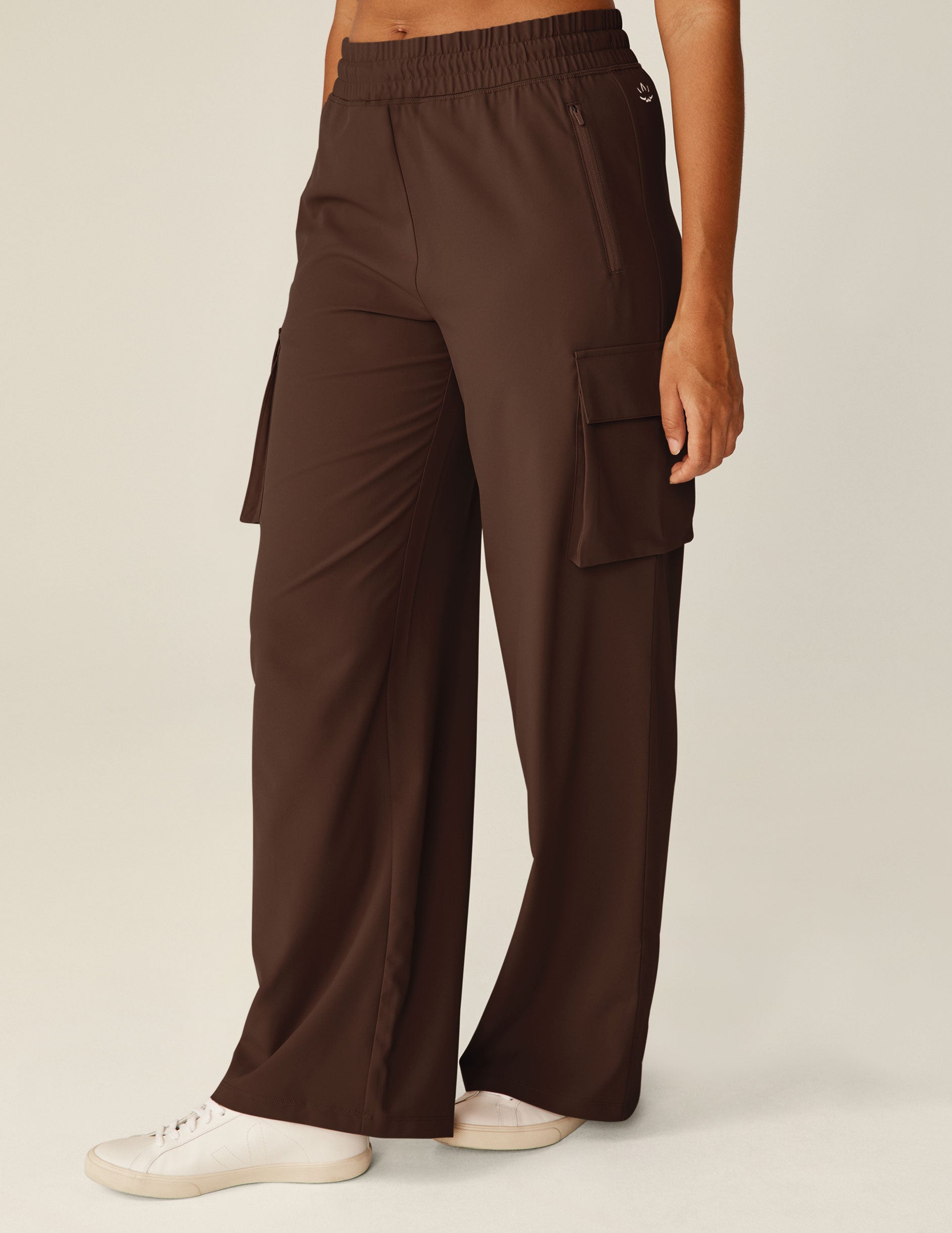 brown cargo style pants with side pockets. 