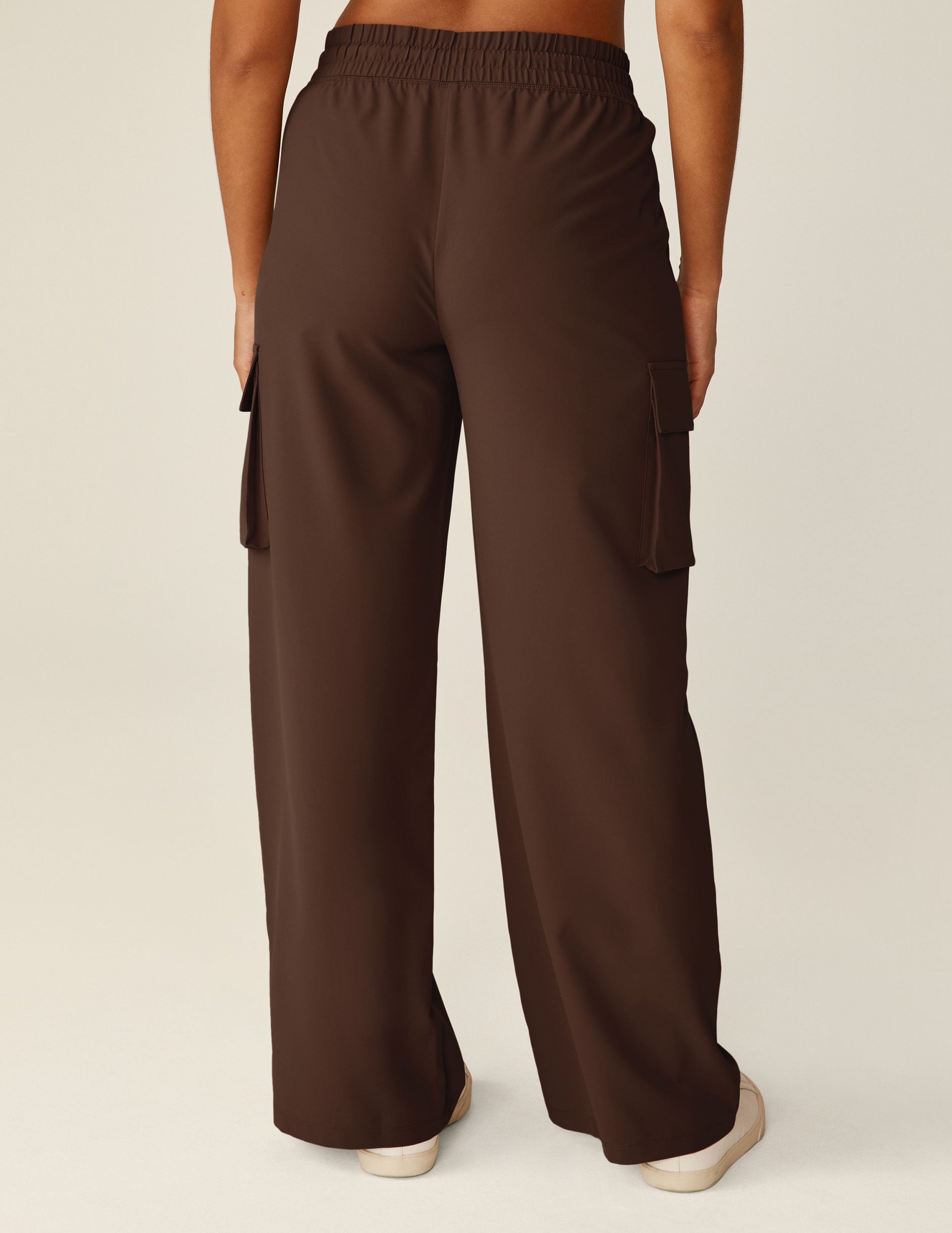 brown cargo style pants with side pockets. 