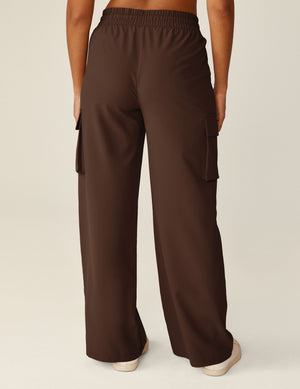 brown cargo style pants with side pockets. 